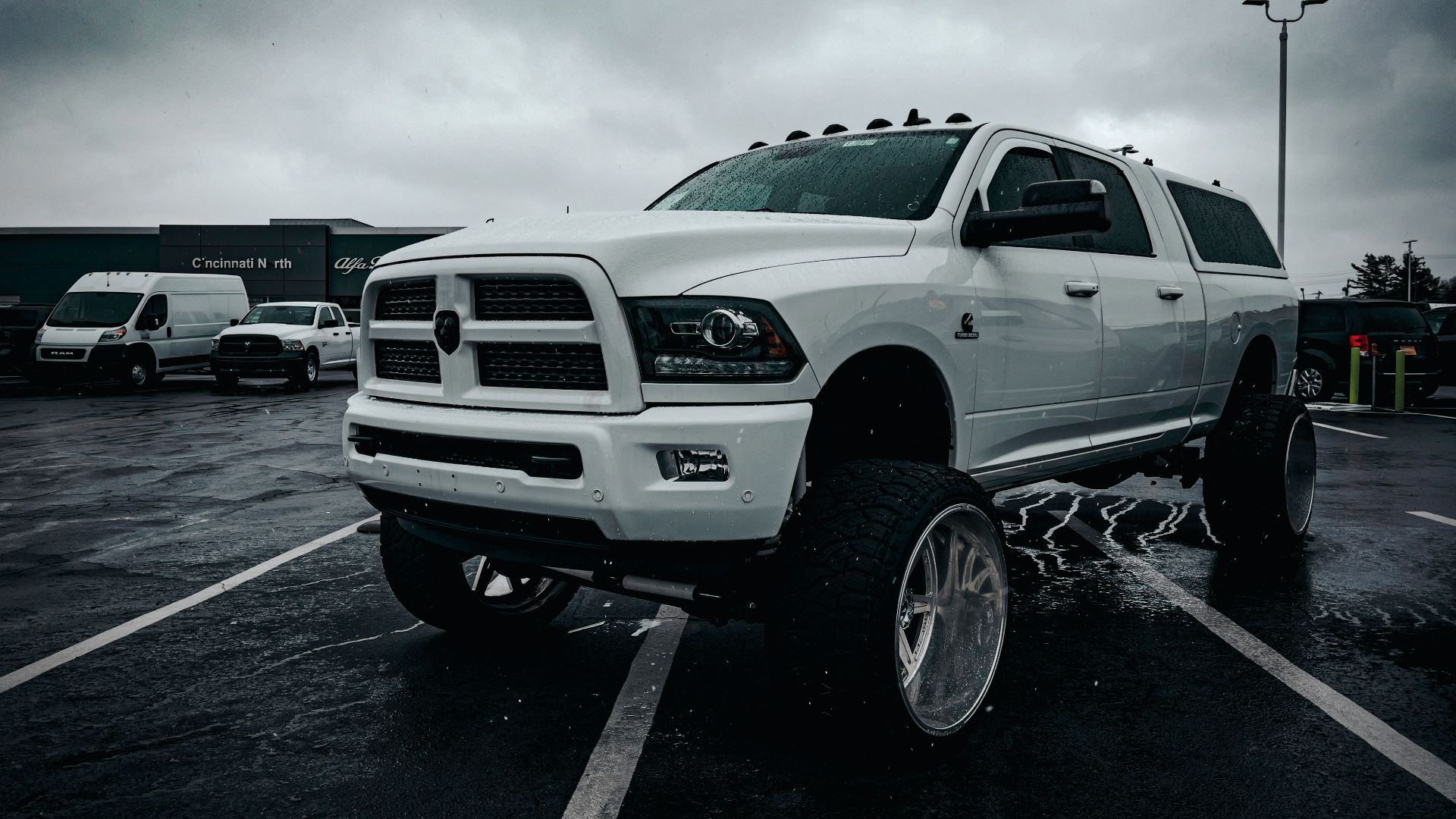a large white truck parked in a parking lot