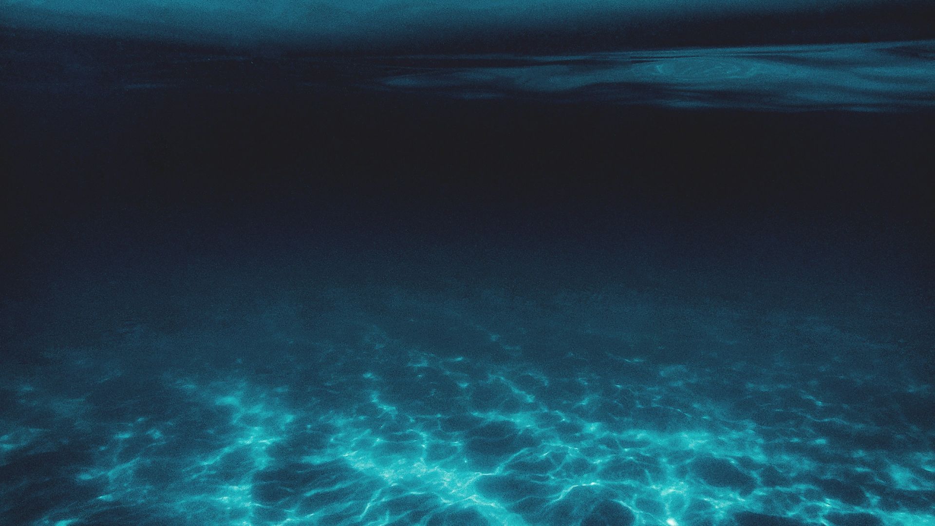 blue water with white bubbles