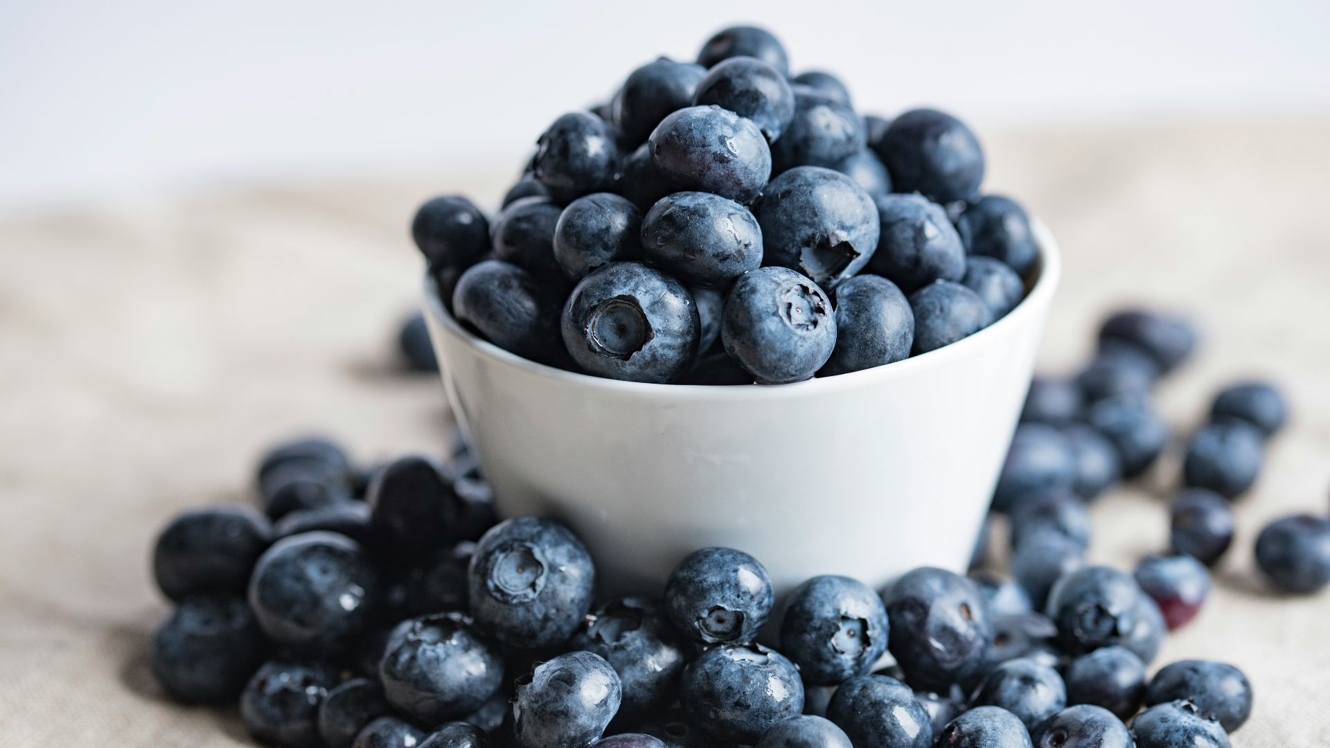 blueberries on white ceramic container
