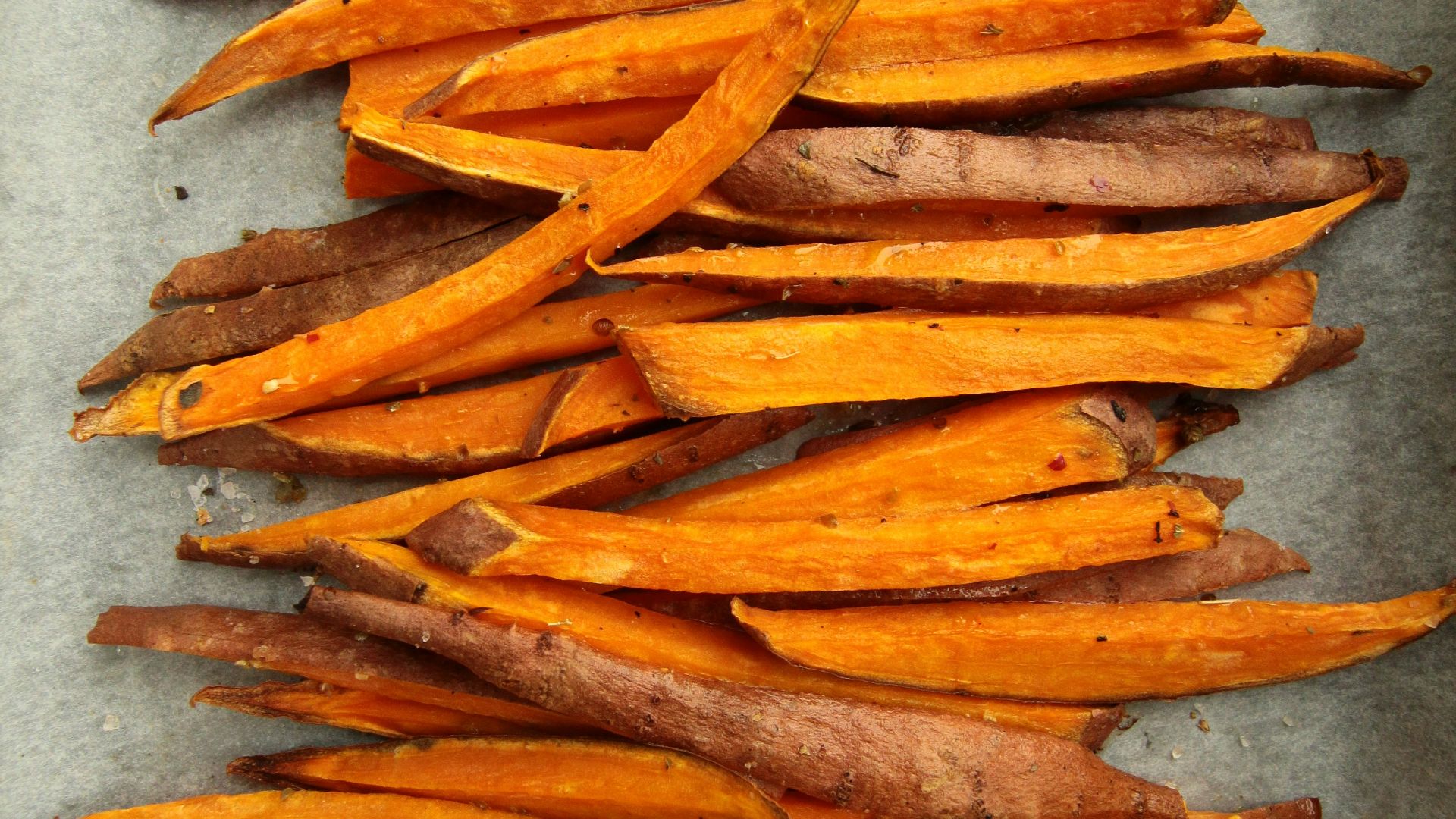 sliced carrots on gray surface