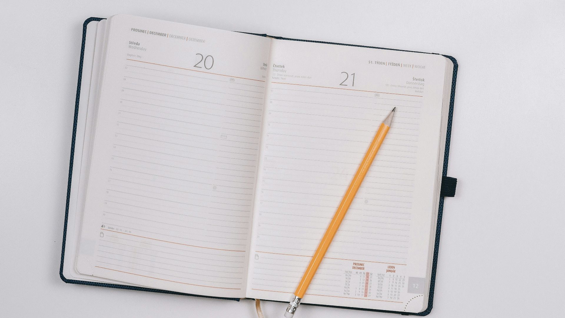 pencil on opened notebook