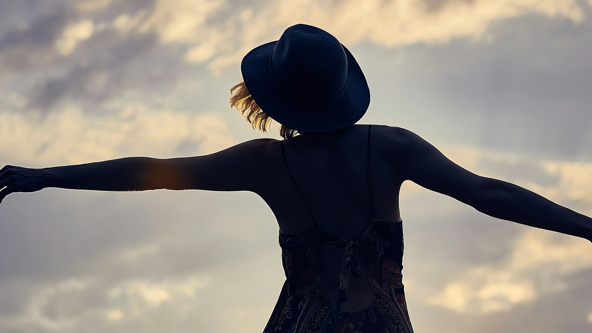 silhouette of woman during sunset