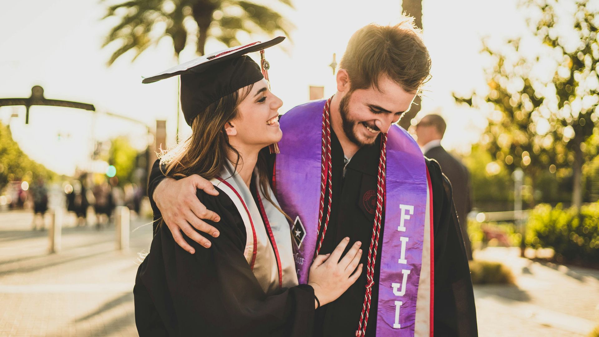 woman hugging man beside her