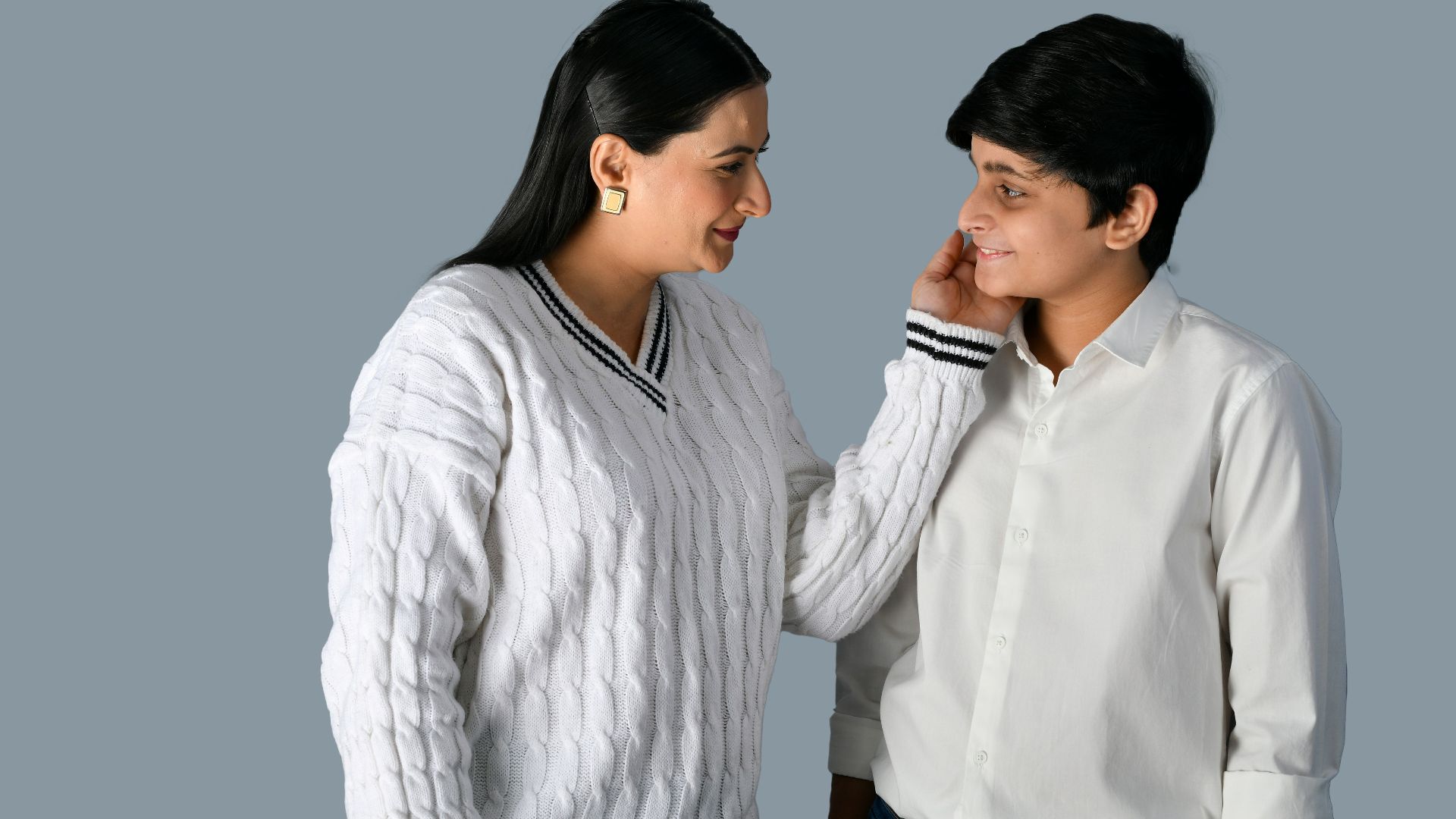 a man and woman looking at each other