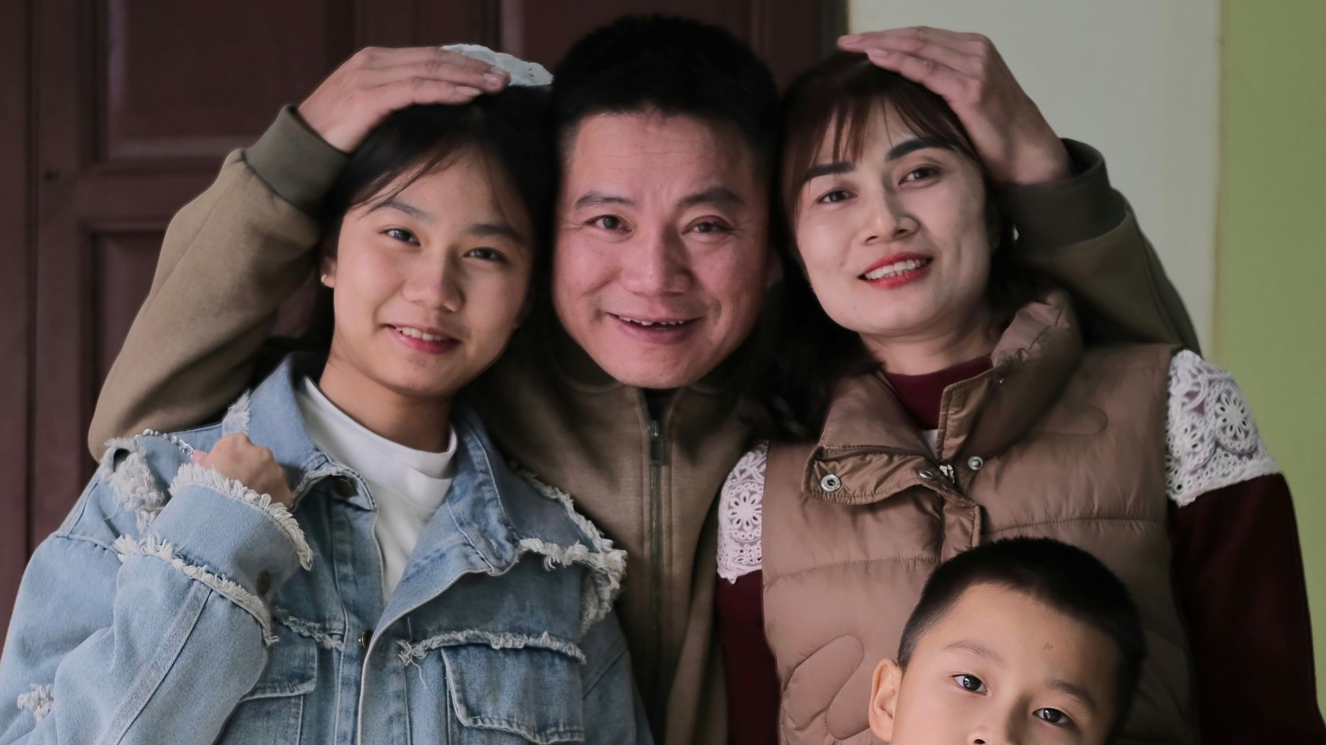 A group of people standing next to each other