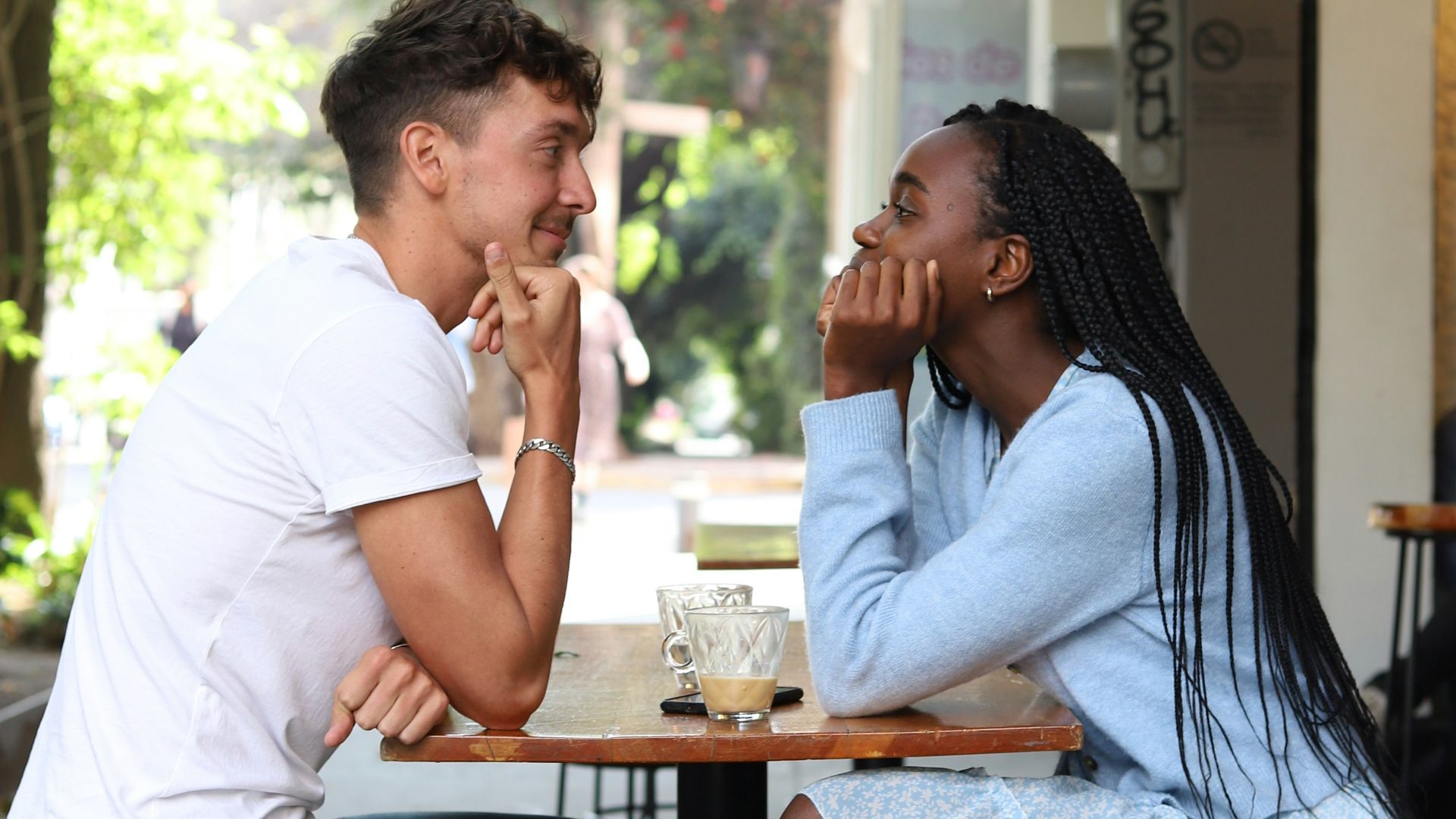 a man and a woman sitting at a table