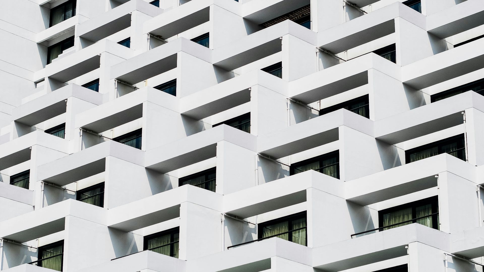 white concrete high-rise building