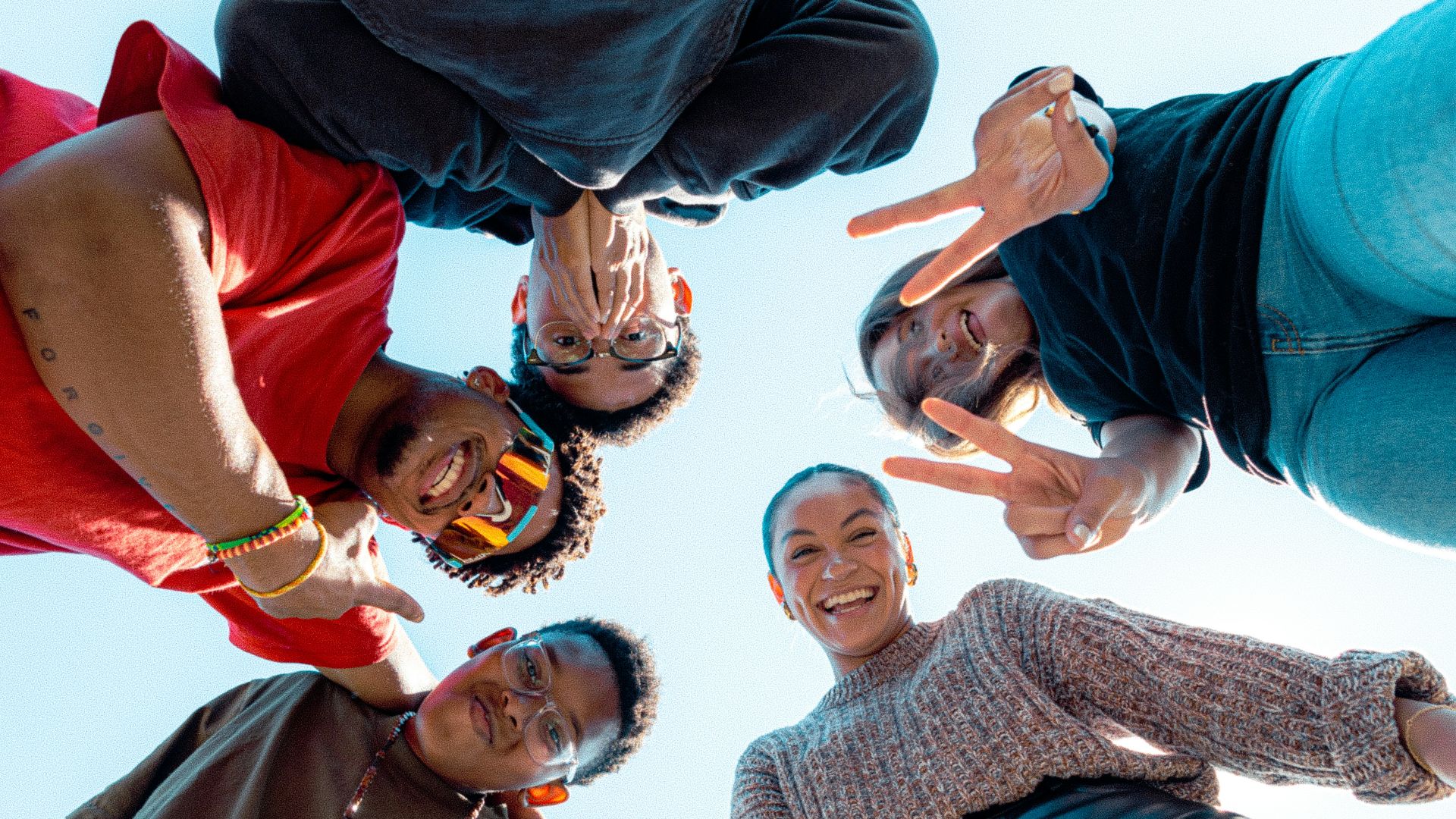 a group of people standing in a circle