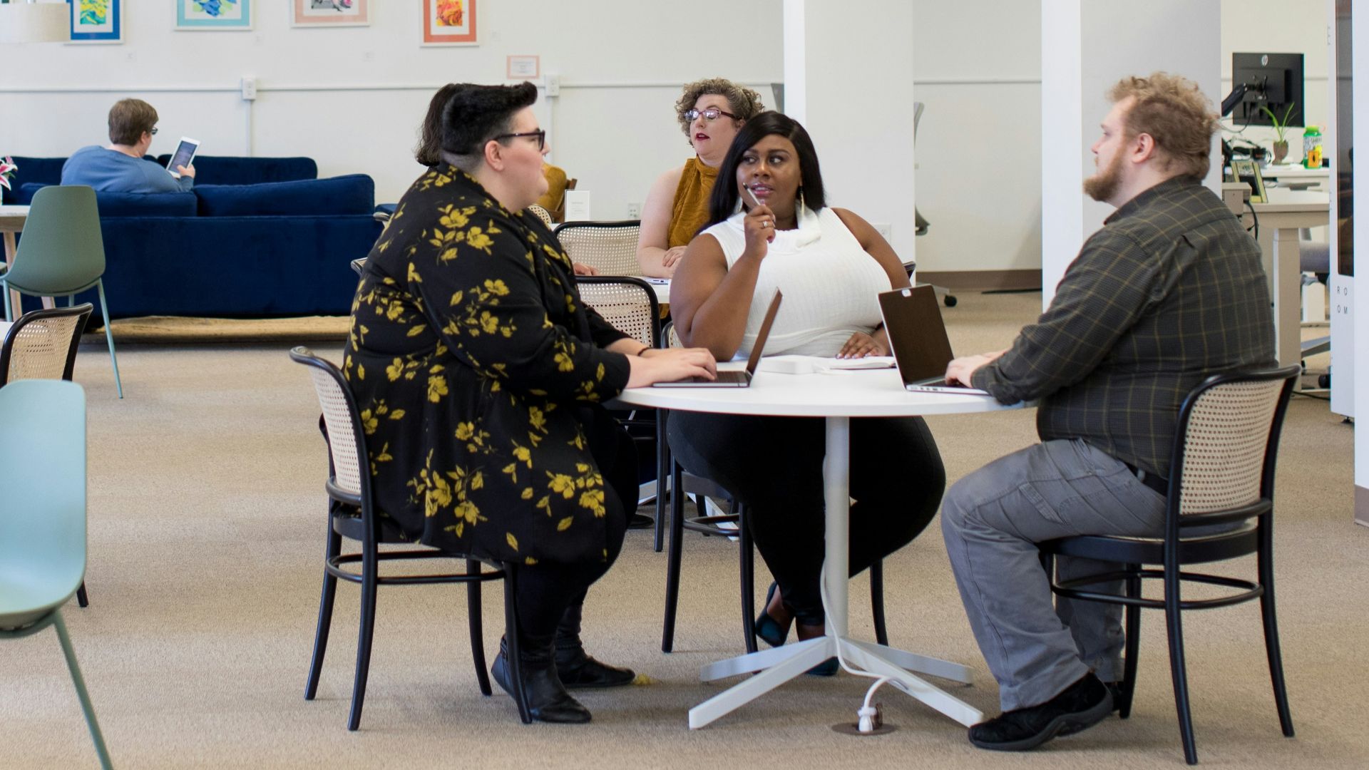 people around table in cafeteria