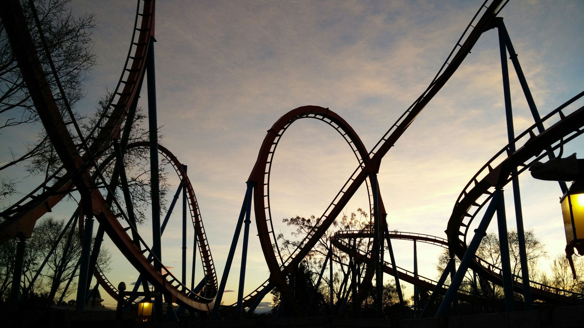 roller coaster ride during golden hour