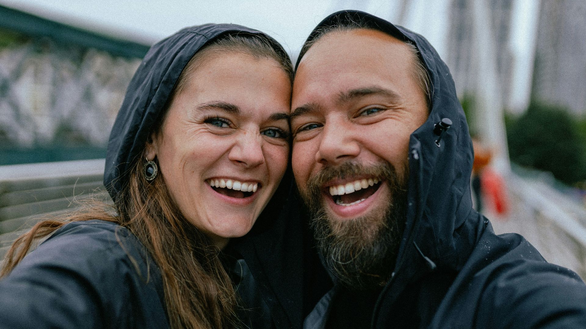 a man and woman smiling