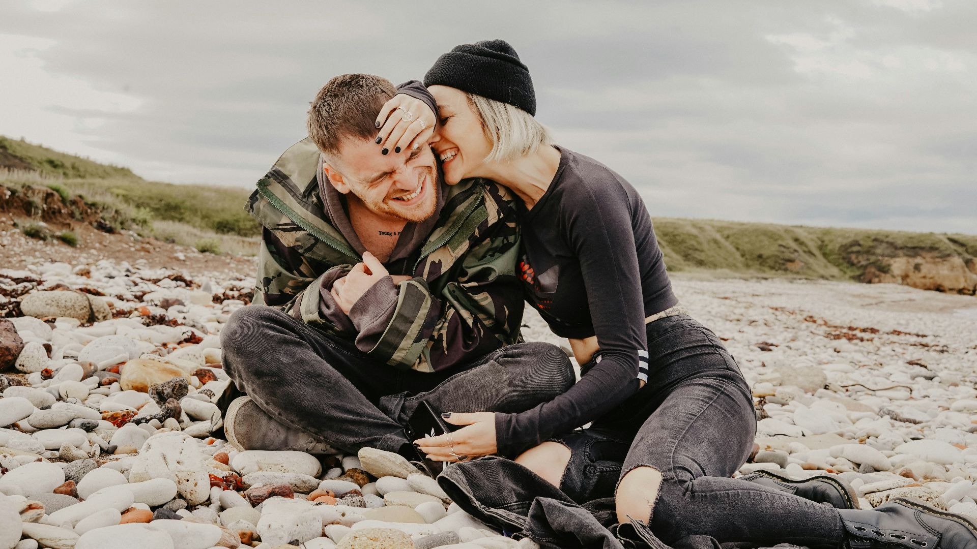 unknown persons sitting outdoors