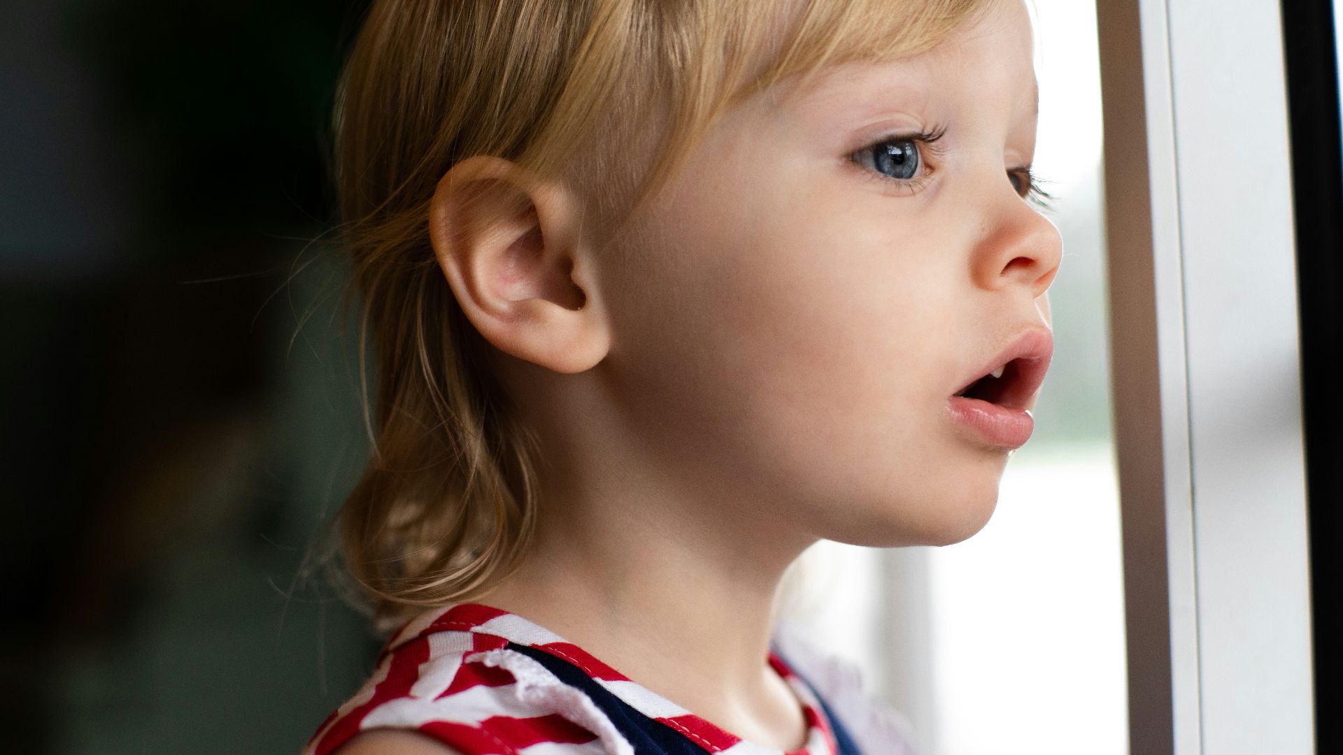 girl in blue and white tank top