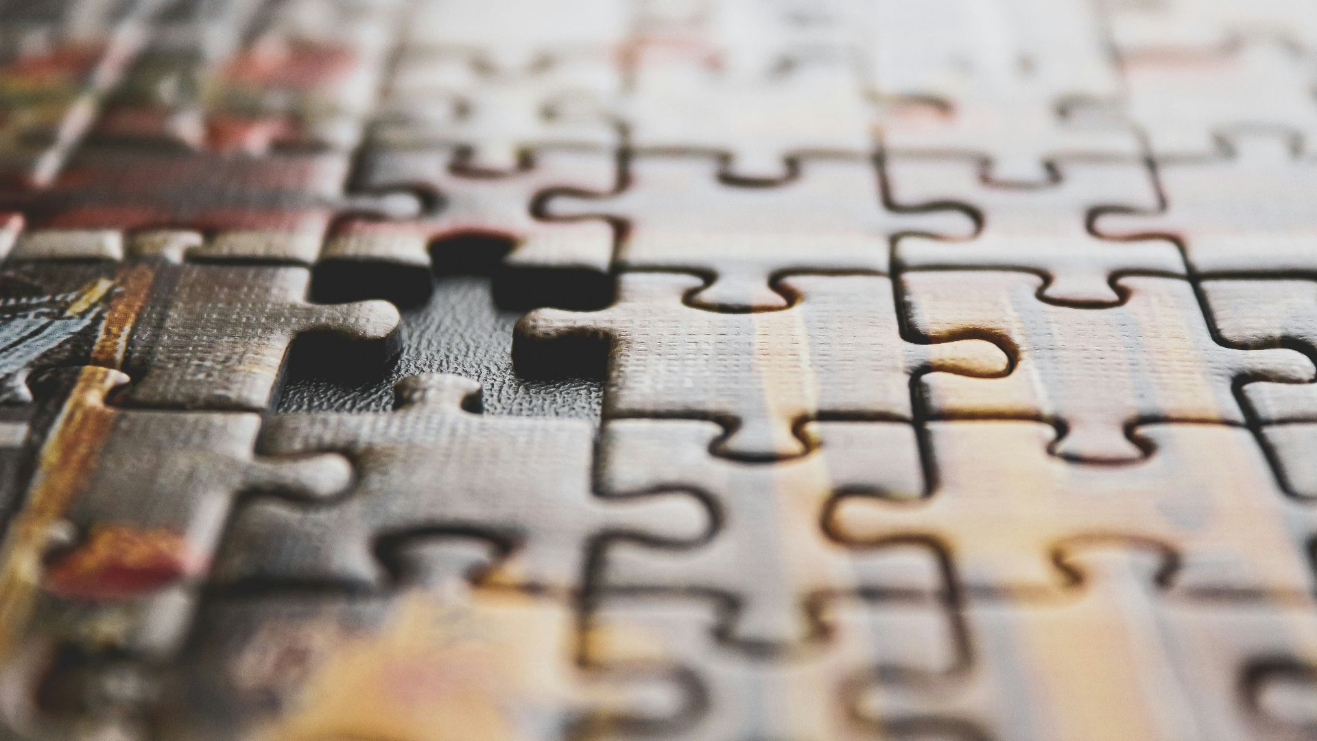 brown and black jigsaw puzzle