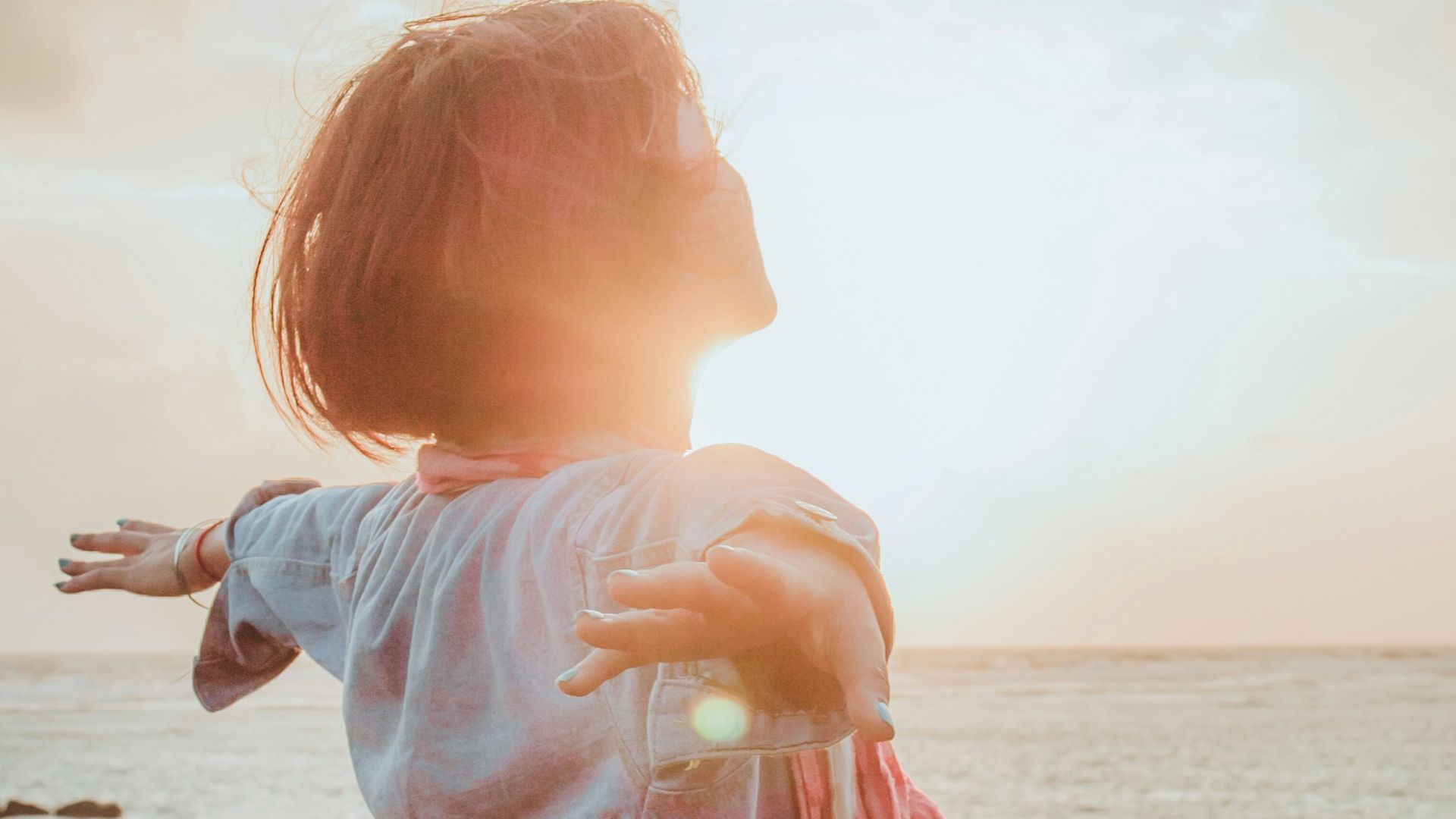 woman spreading her arms