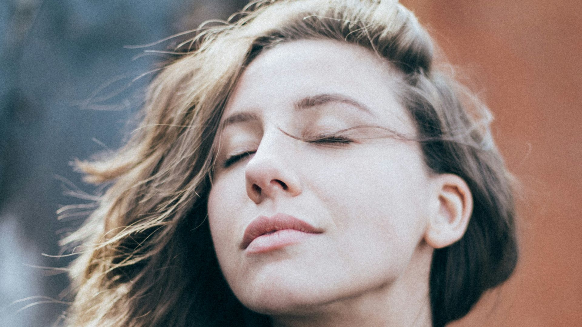 closeup photo of woman wearing black top