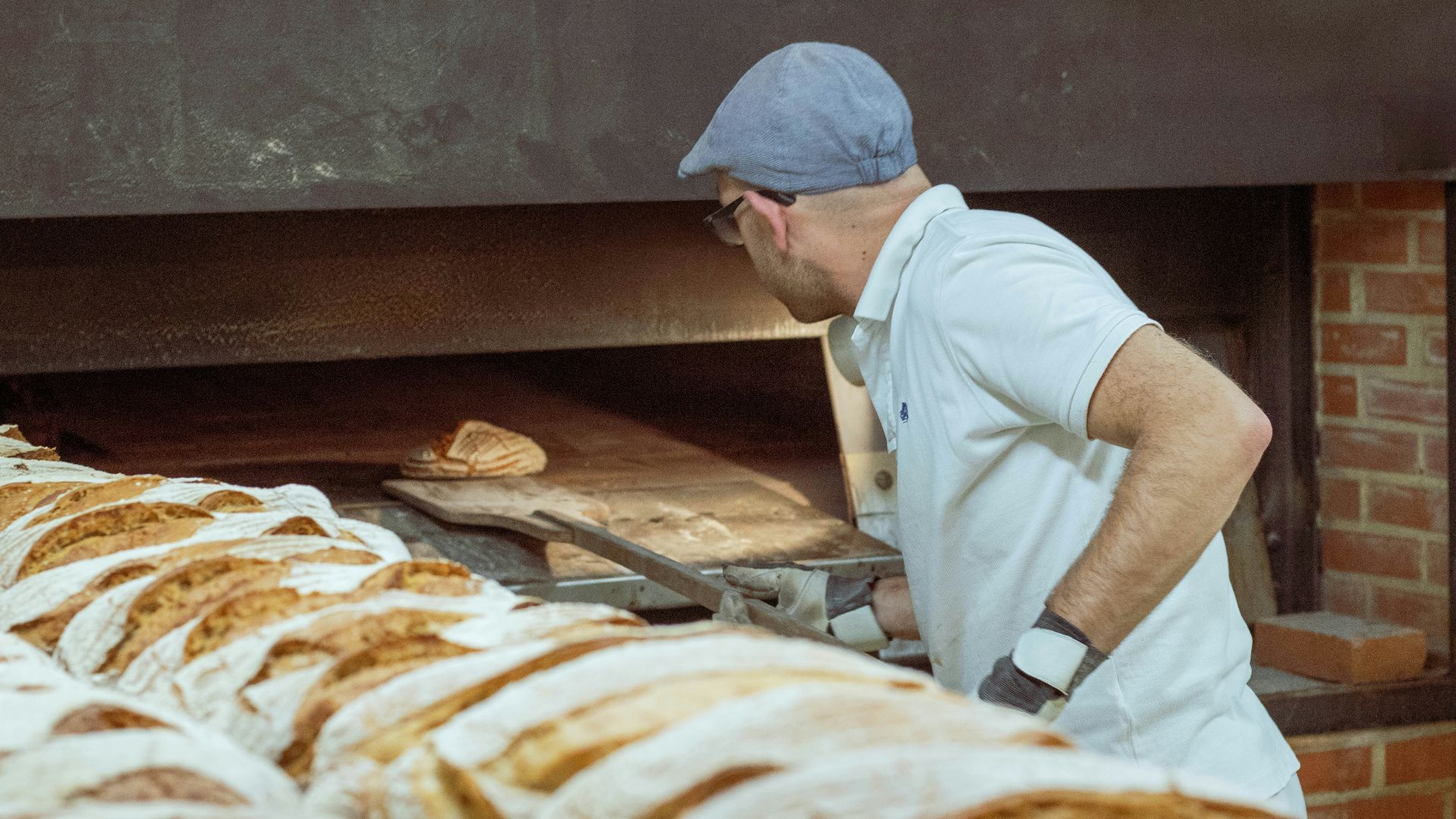 man wearing white polo shirt