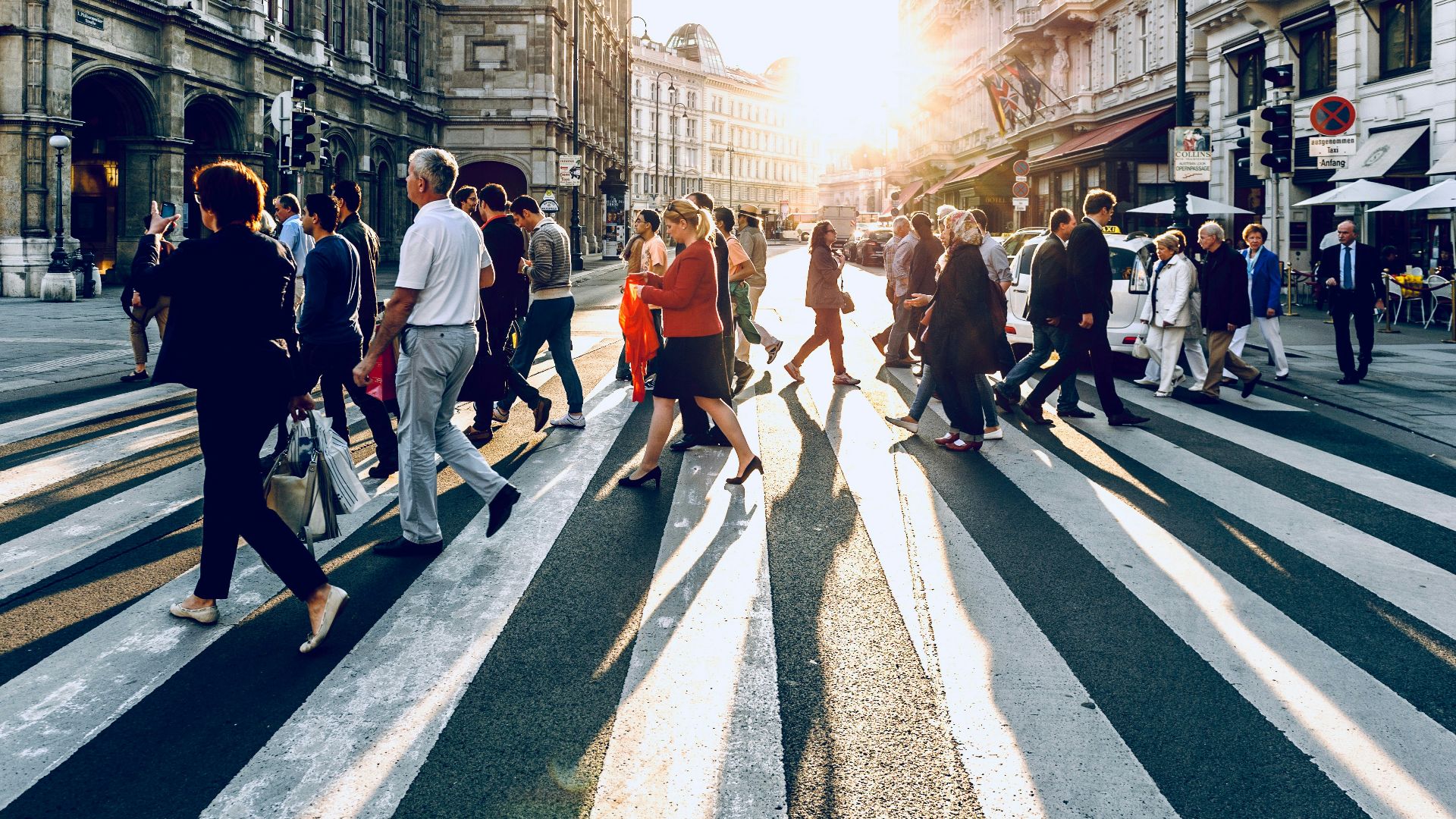 group of people walking on pedestrian lane