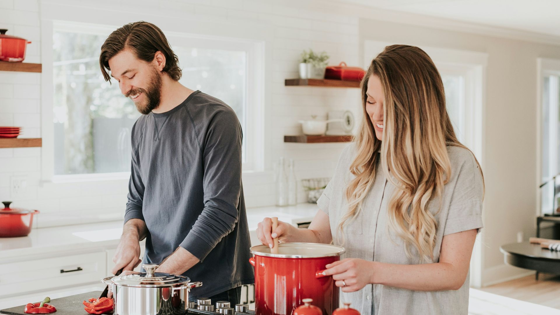 man and woman on kitchen
