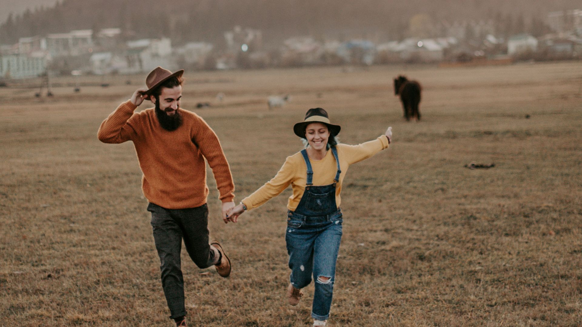 man holdind woman hand