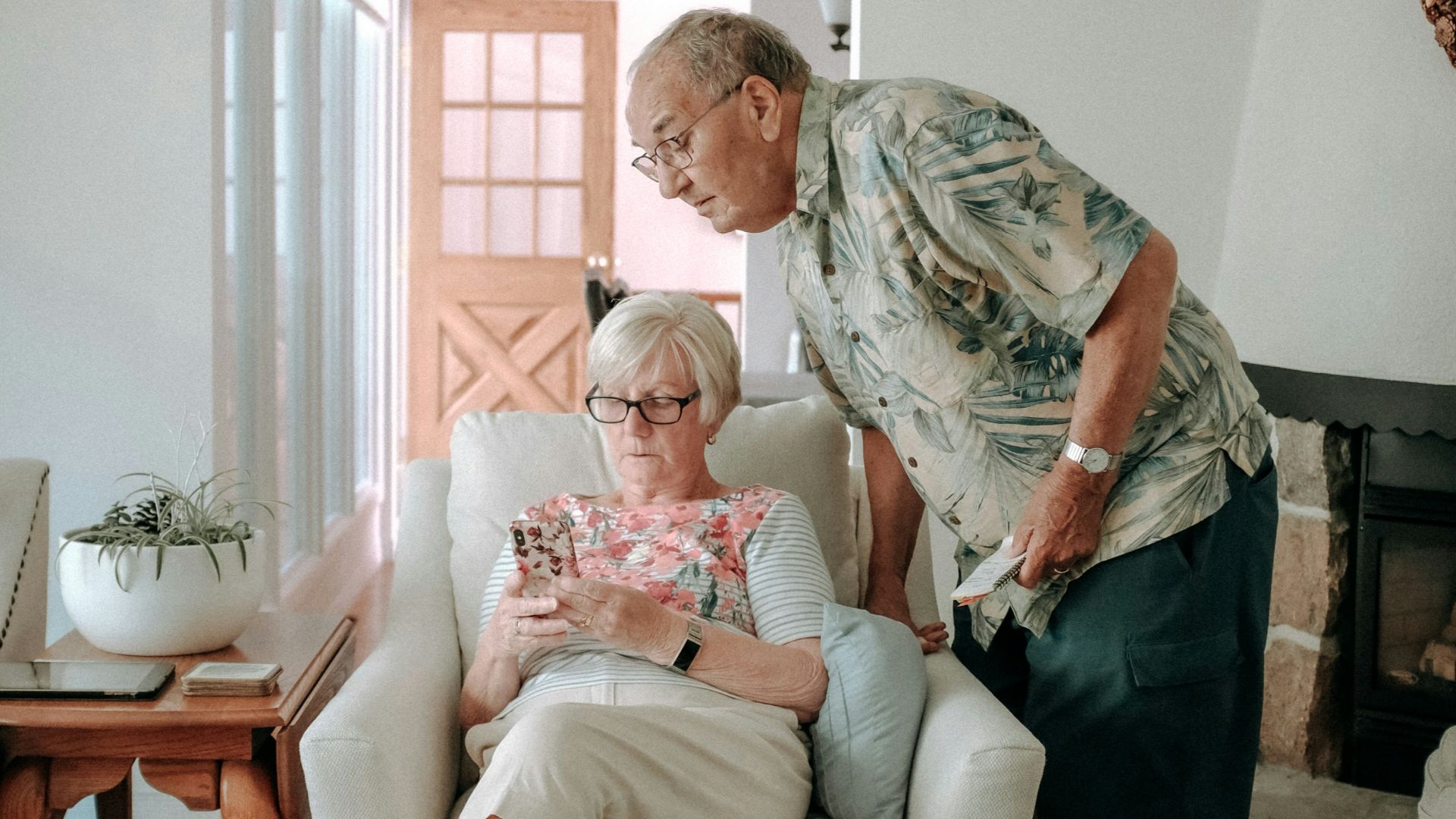 a woman and a man in a living room