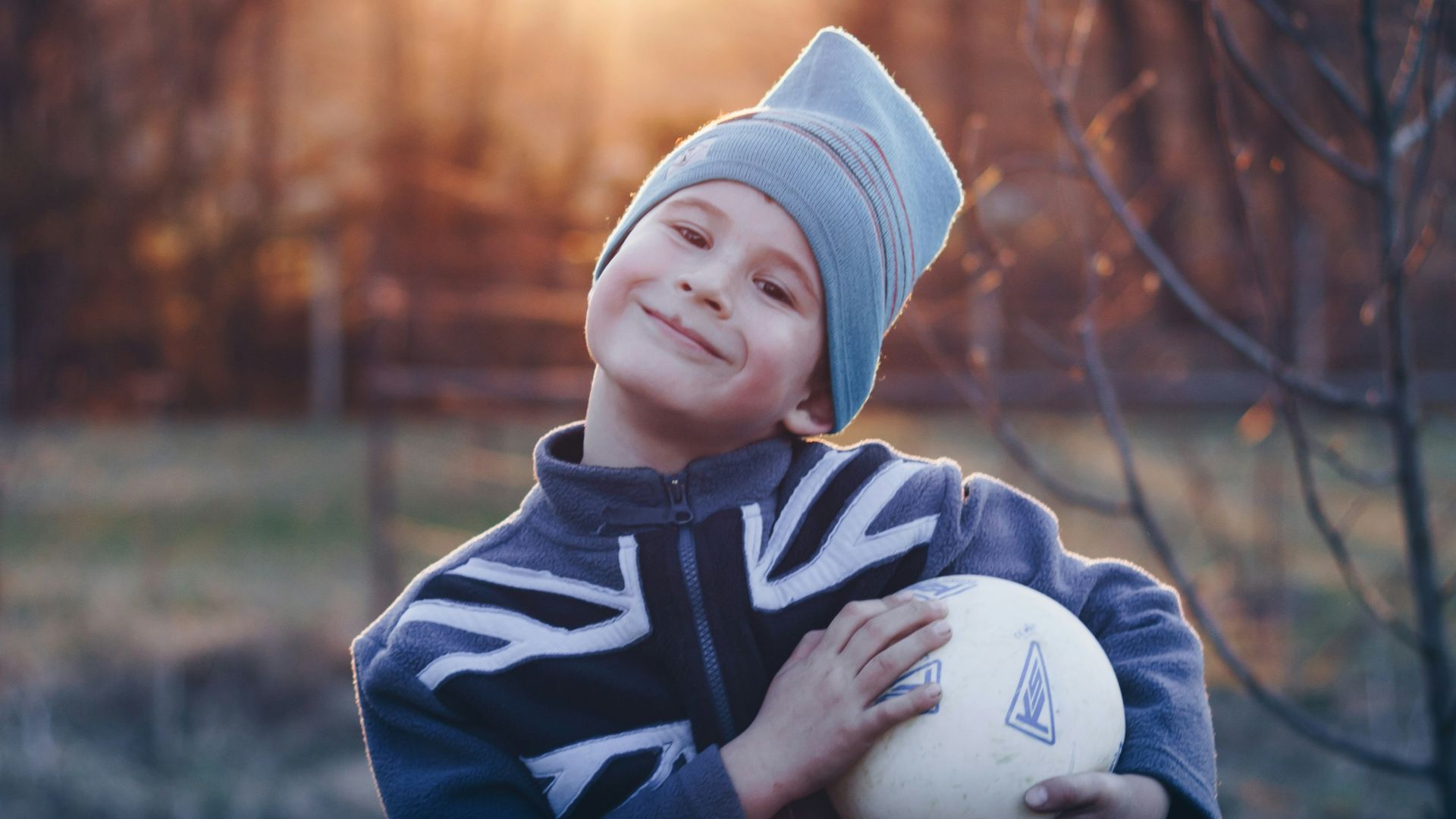 boy holding a ball