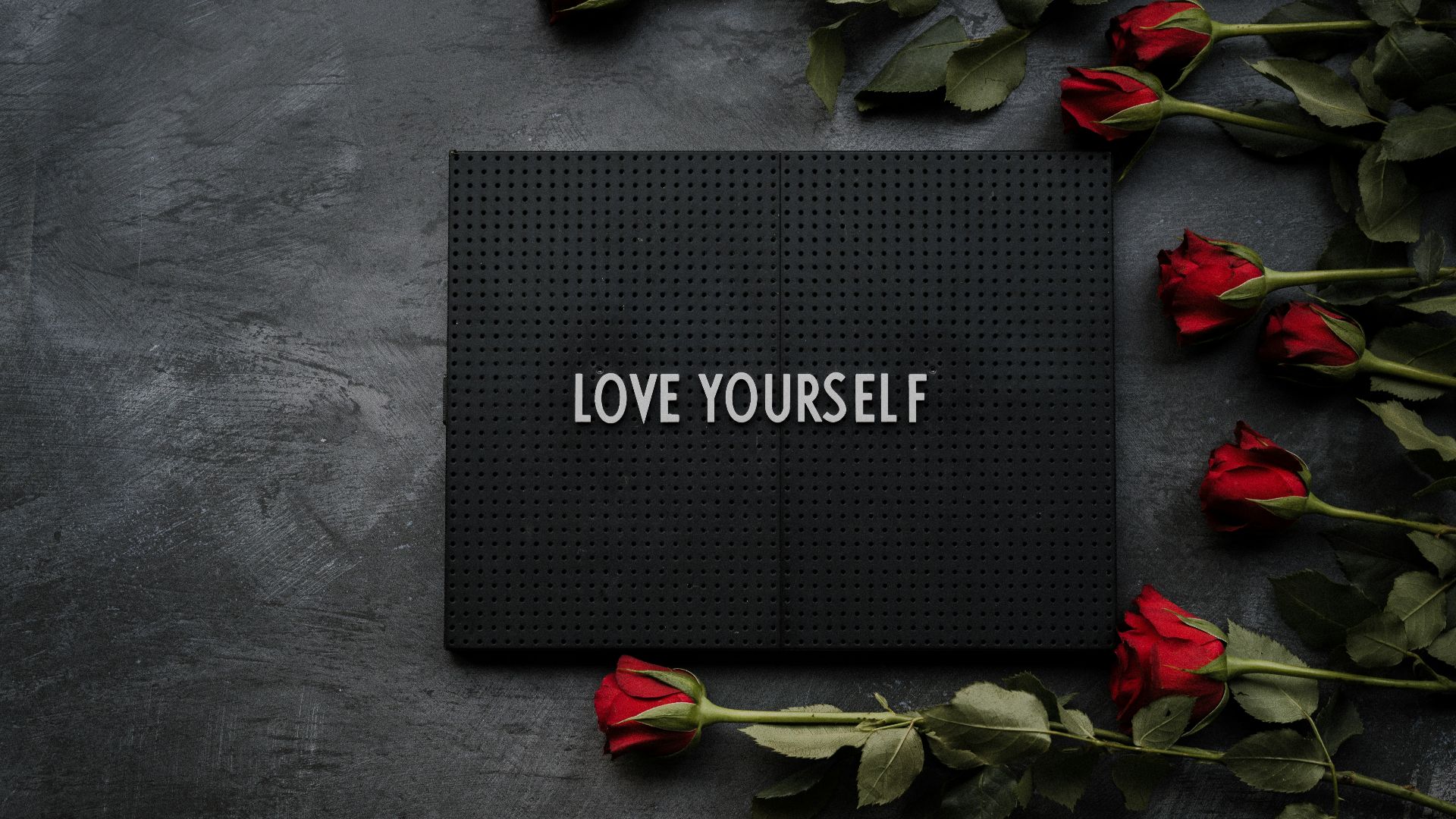 black and red floral happy birthday signage