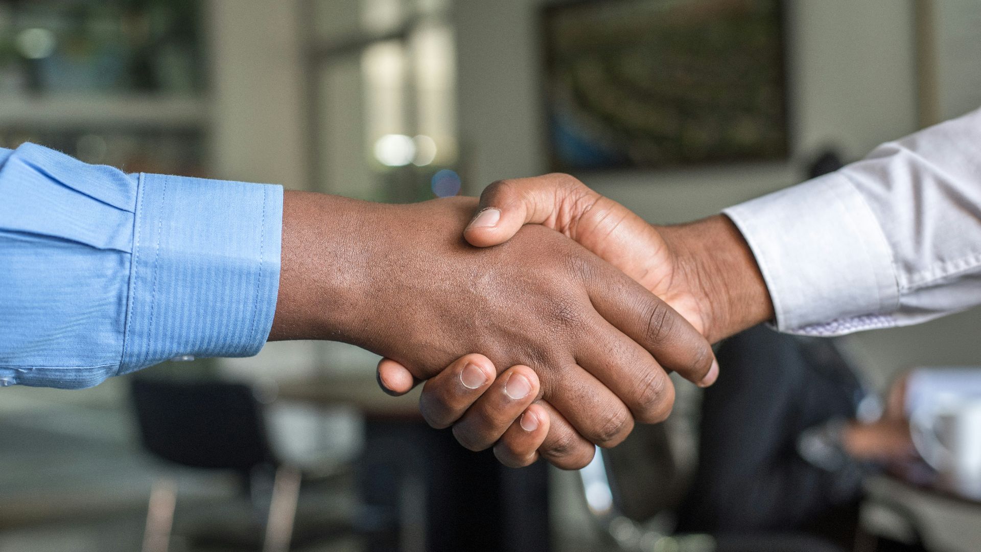 two people shaking hands