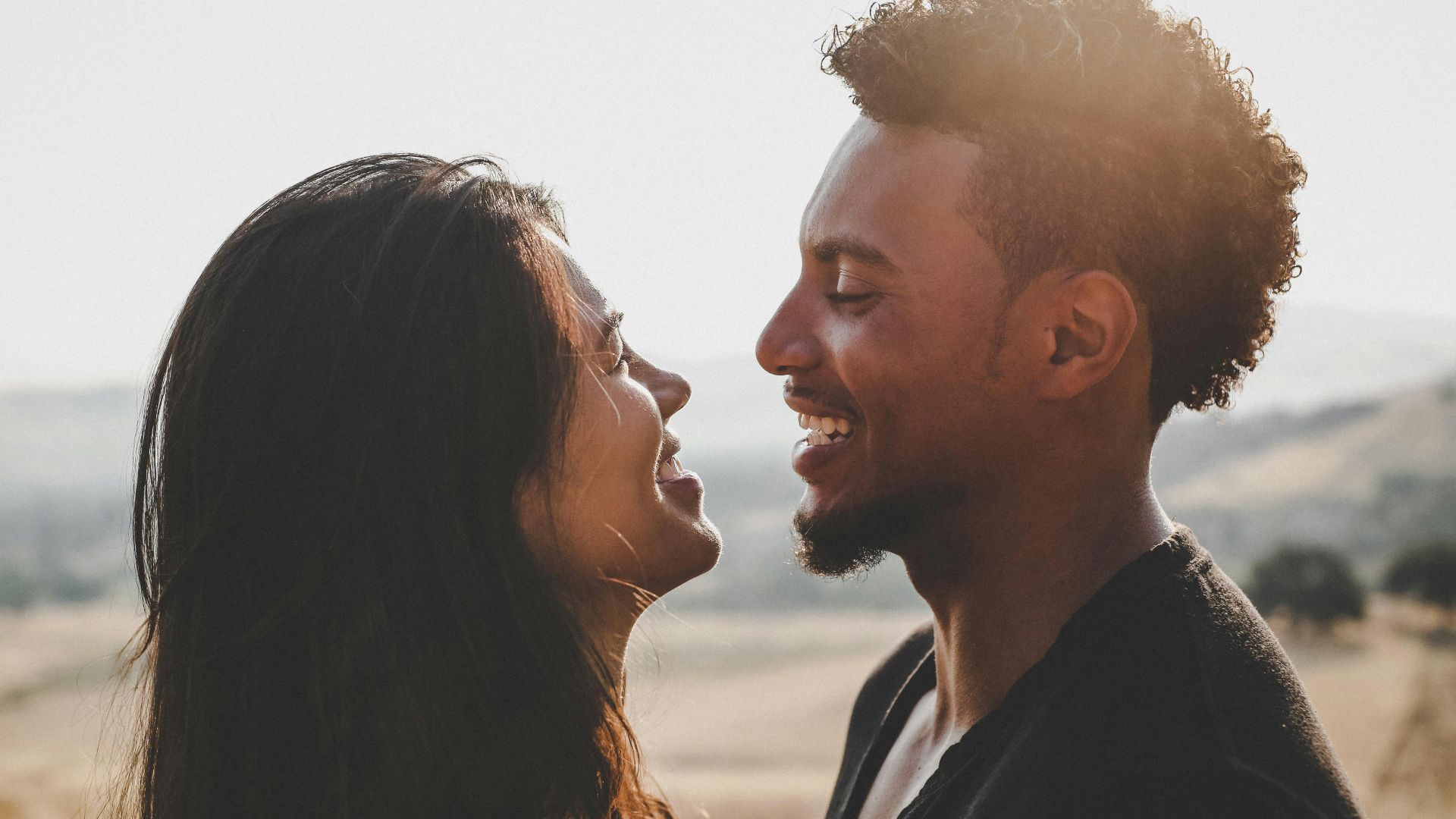 man and woman facing
