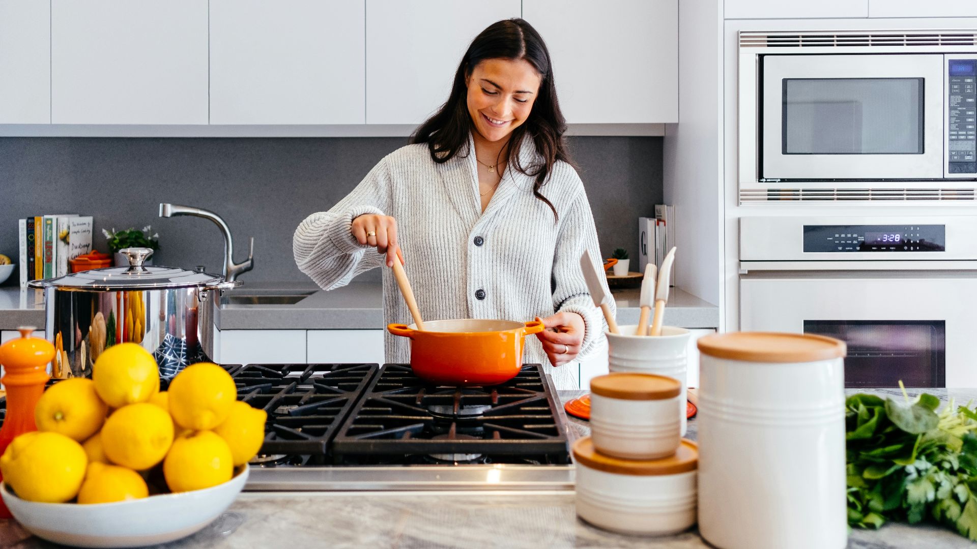 woman cooking inside kitchen room