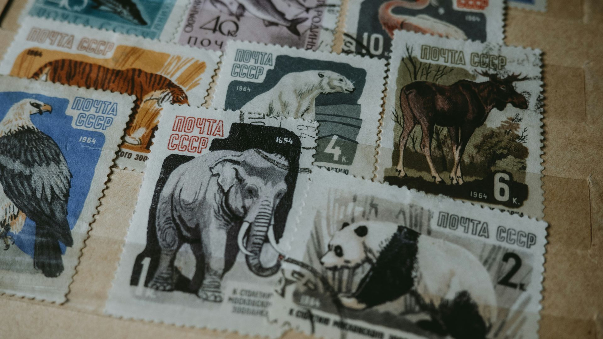 a bunch of stamps with different animals on them