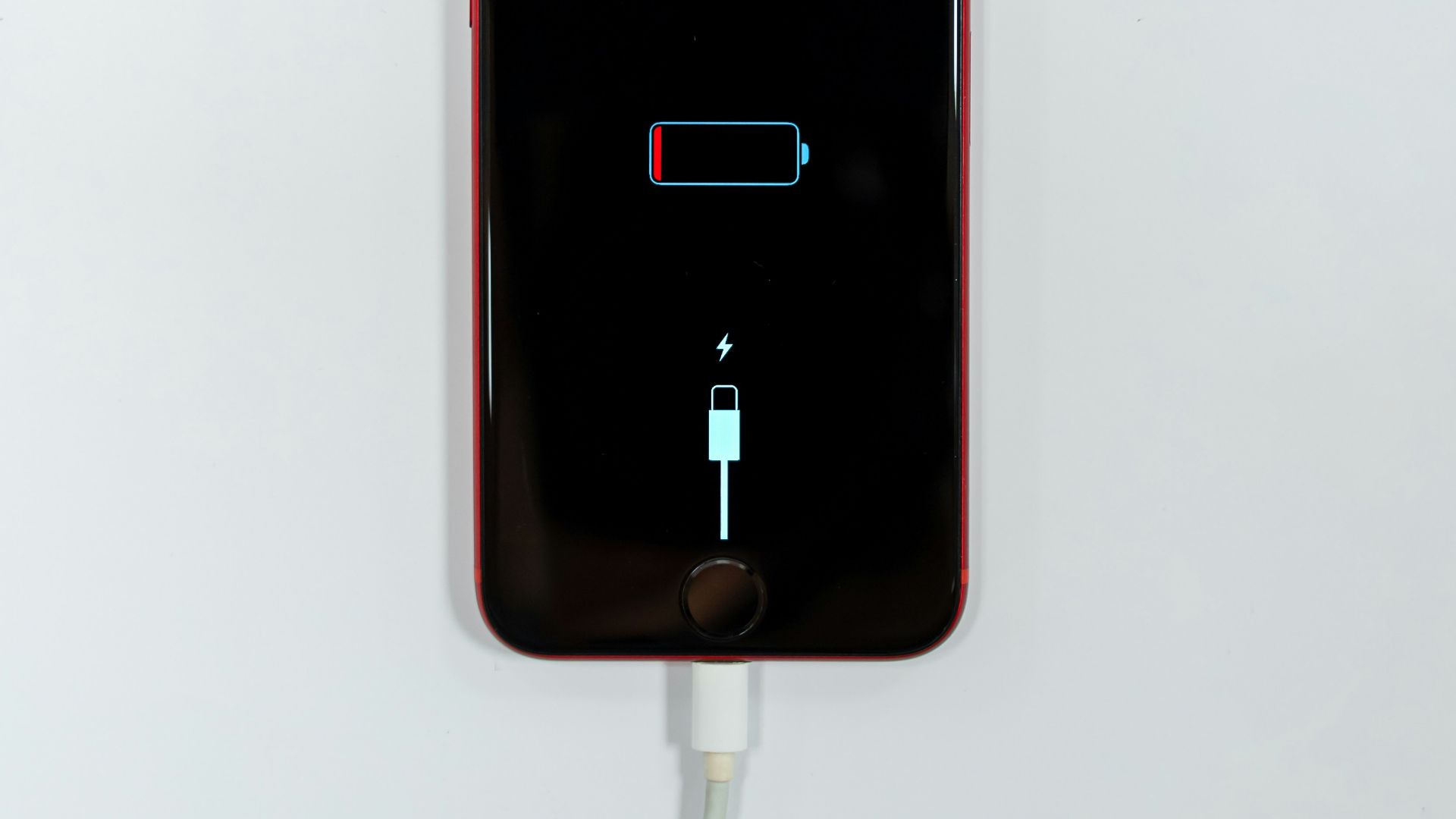 black iphone 5 on white surface