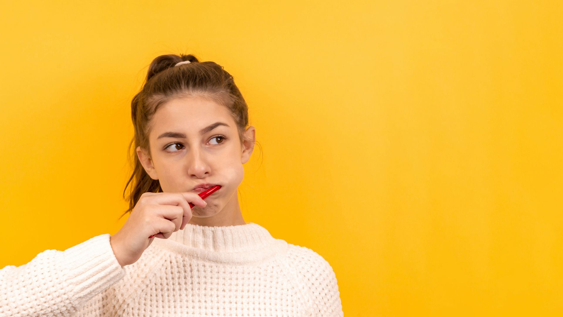 woman in white knit sweater