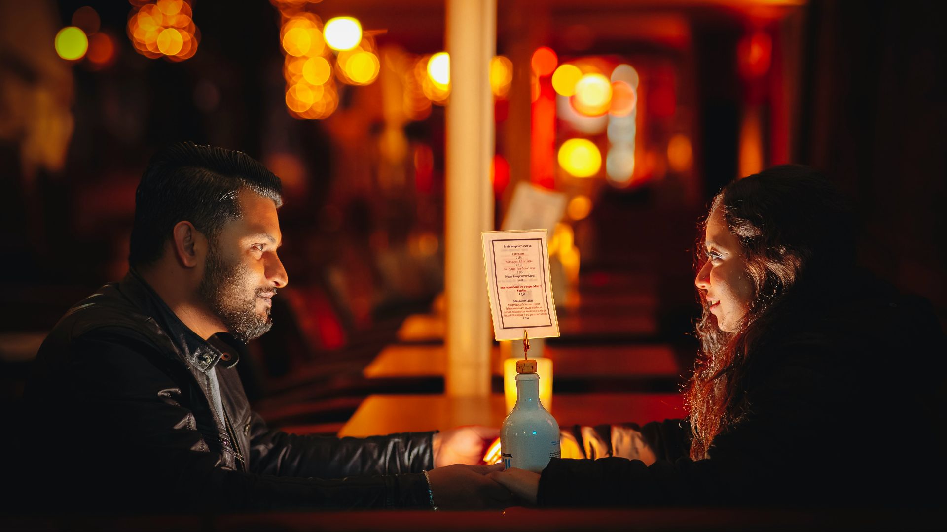 A man and a woman sitting at a table