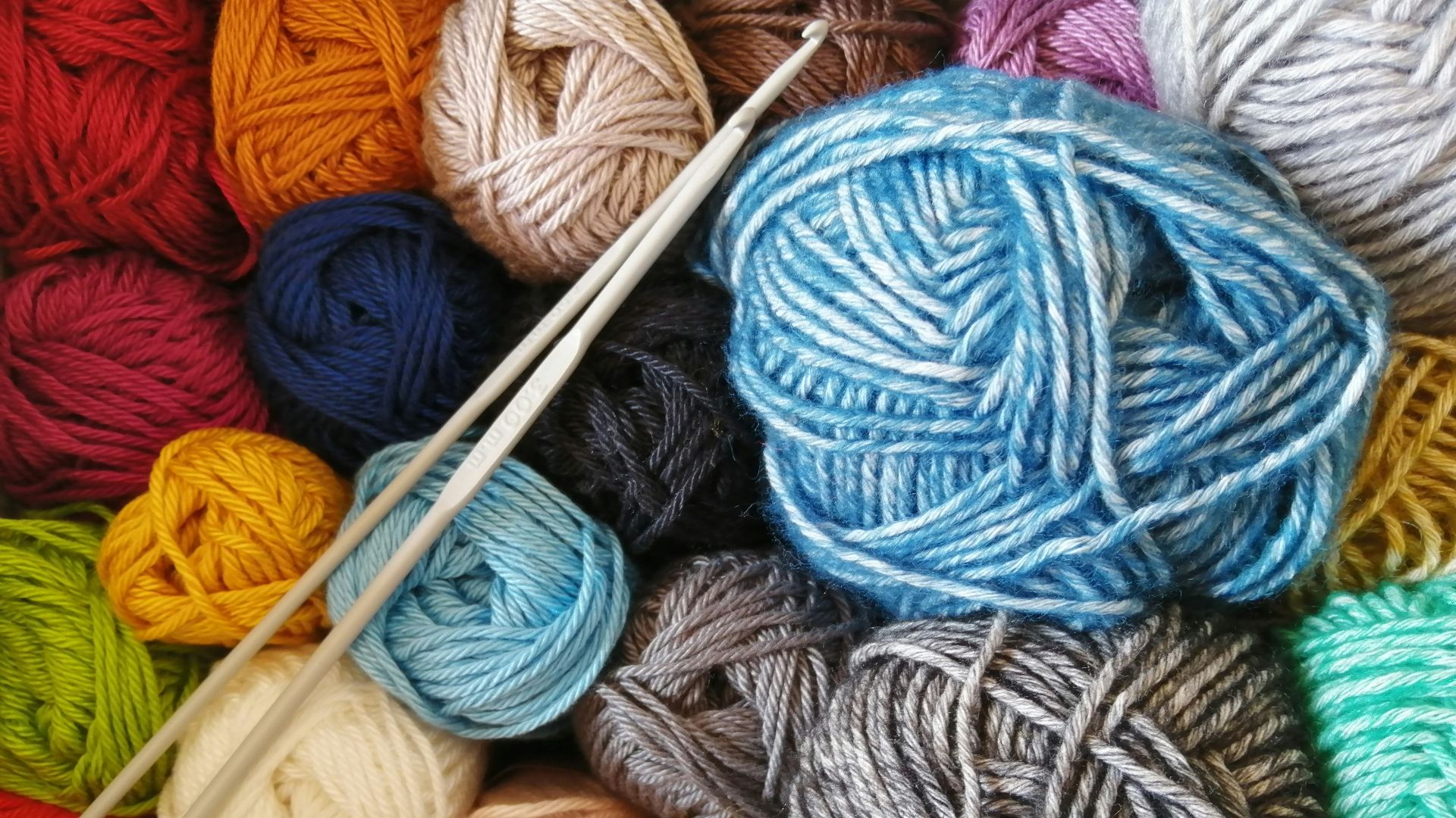 orange blue and white yarn