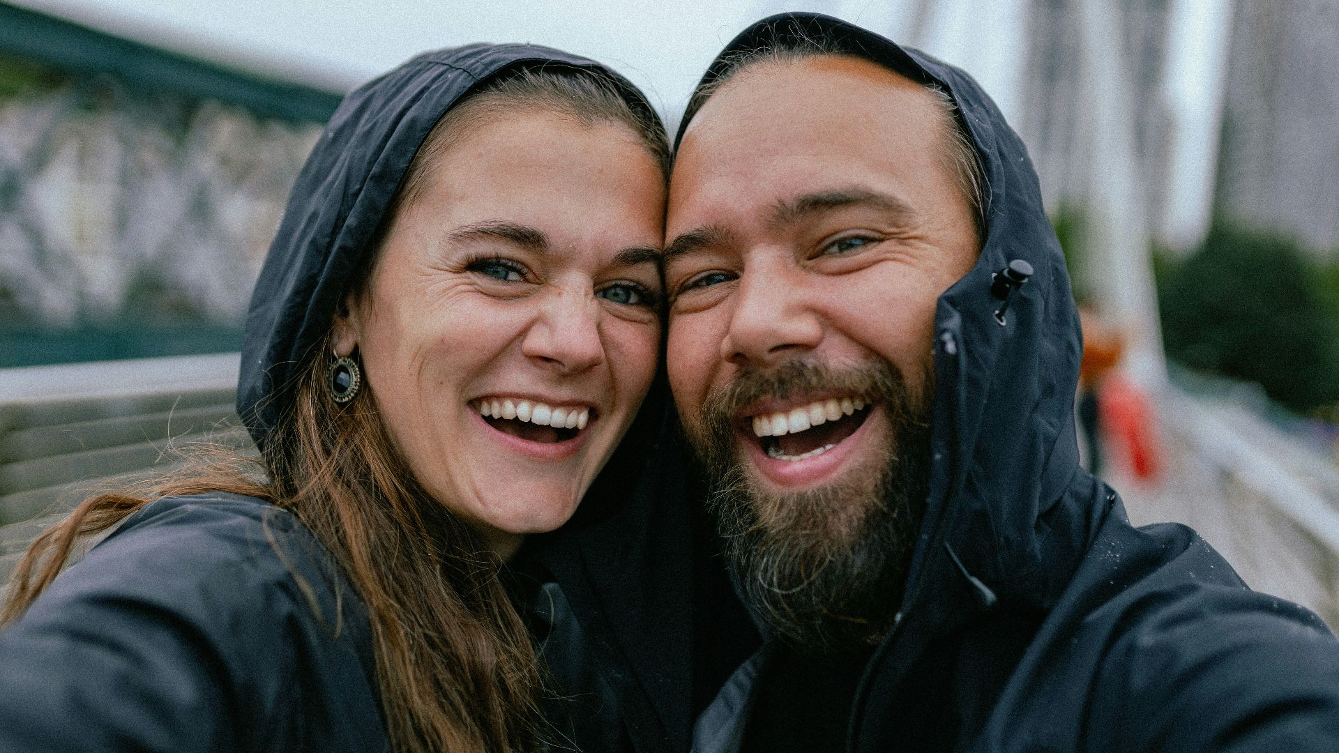 a man and woman smiling