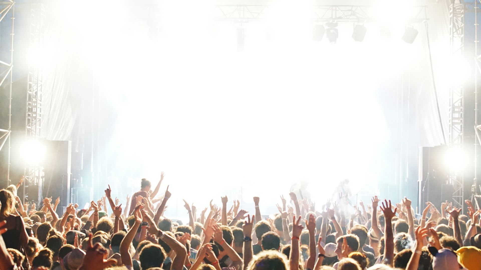 people standing beside stage