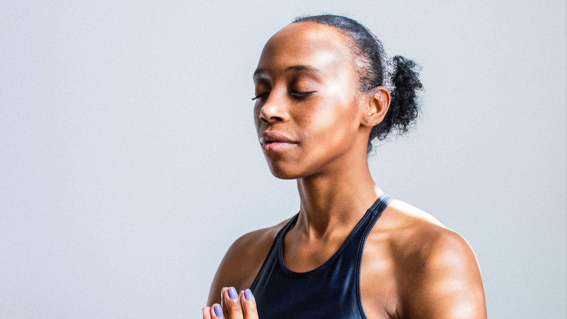 woman wearing black sports bra