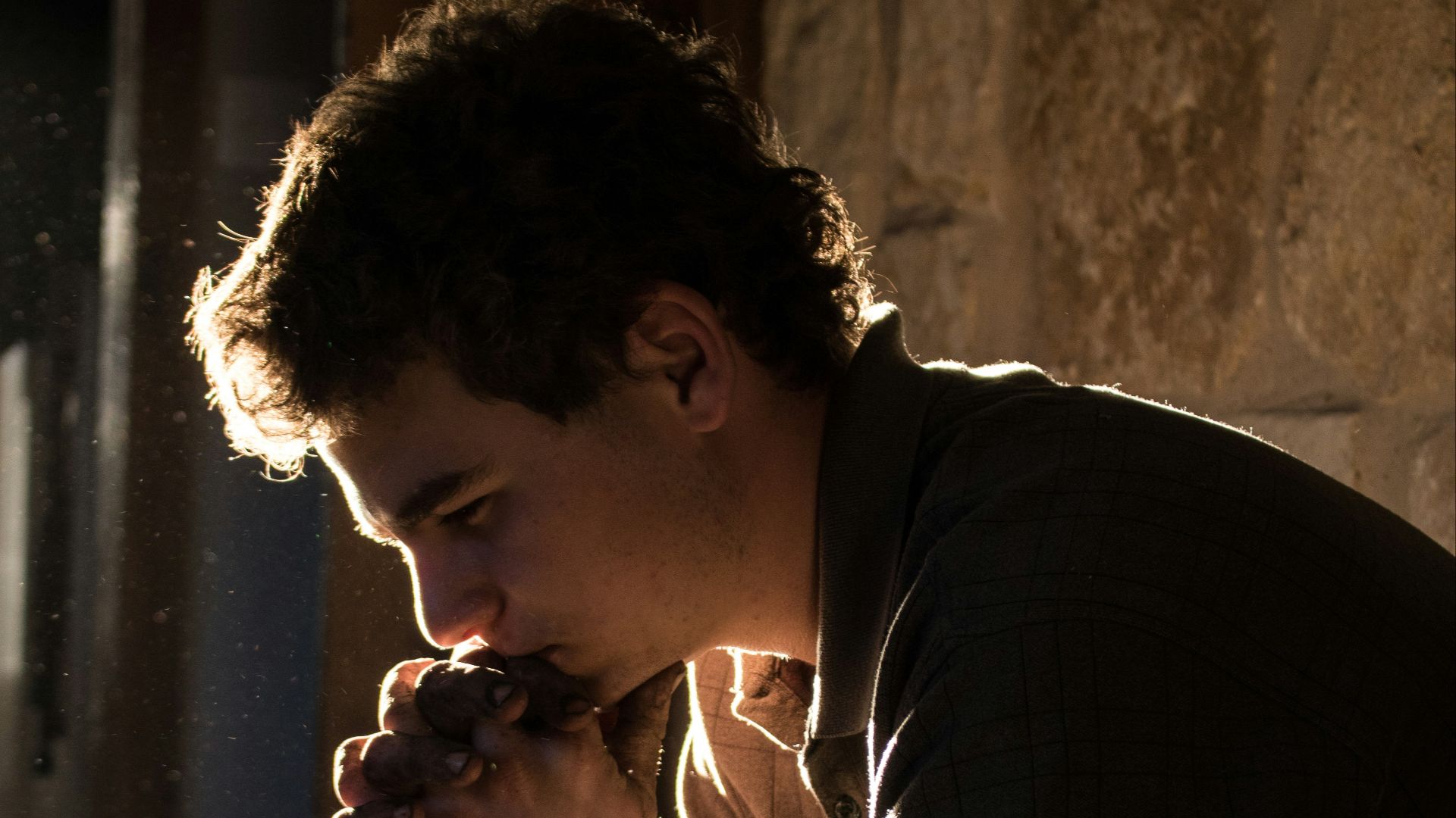 man sitting on bench