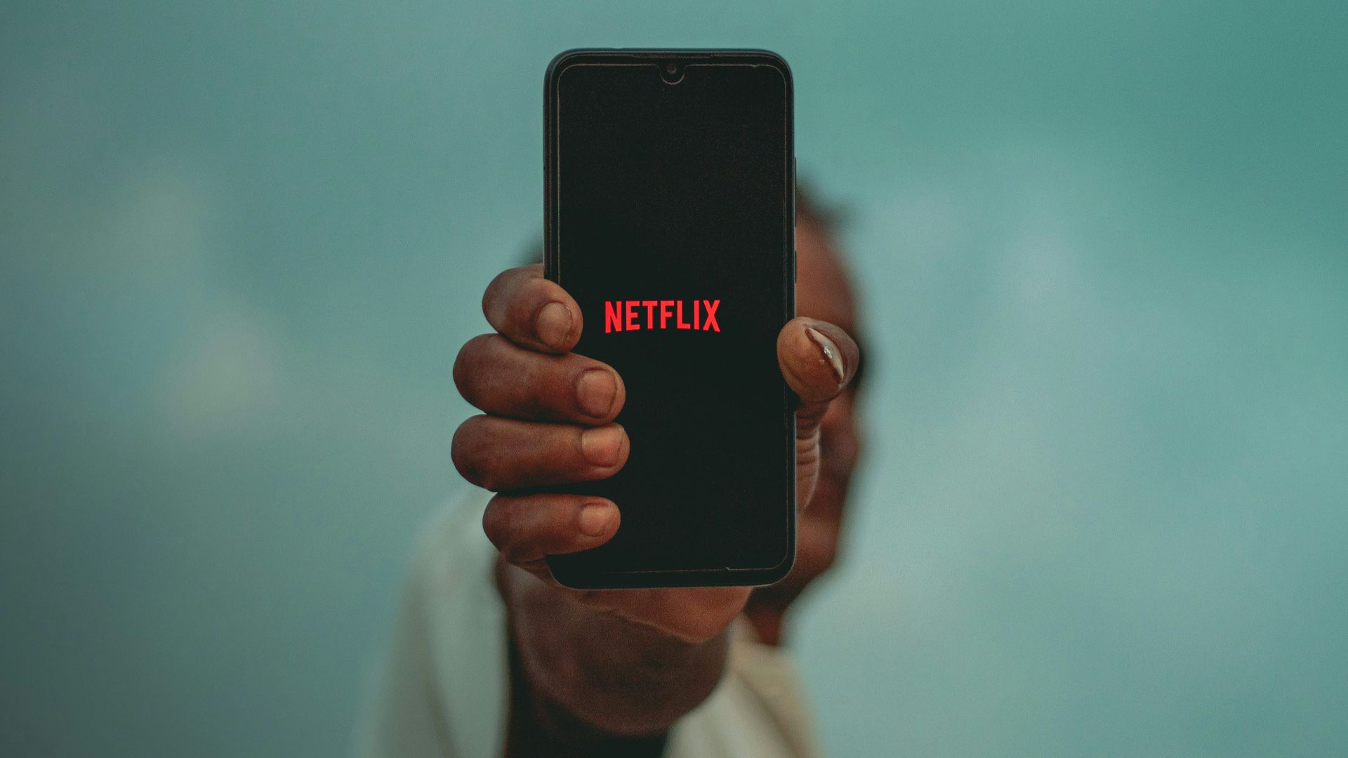 person holding black iphone 5