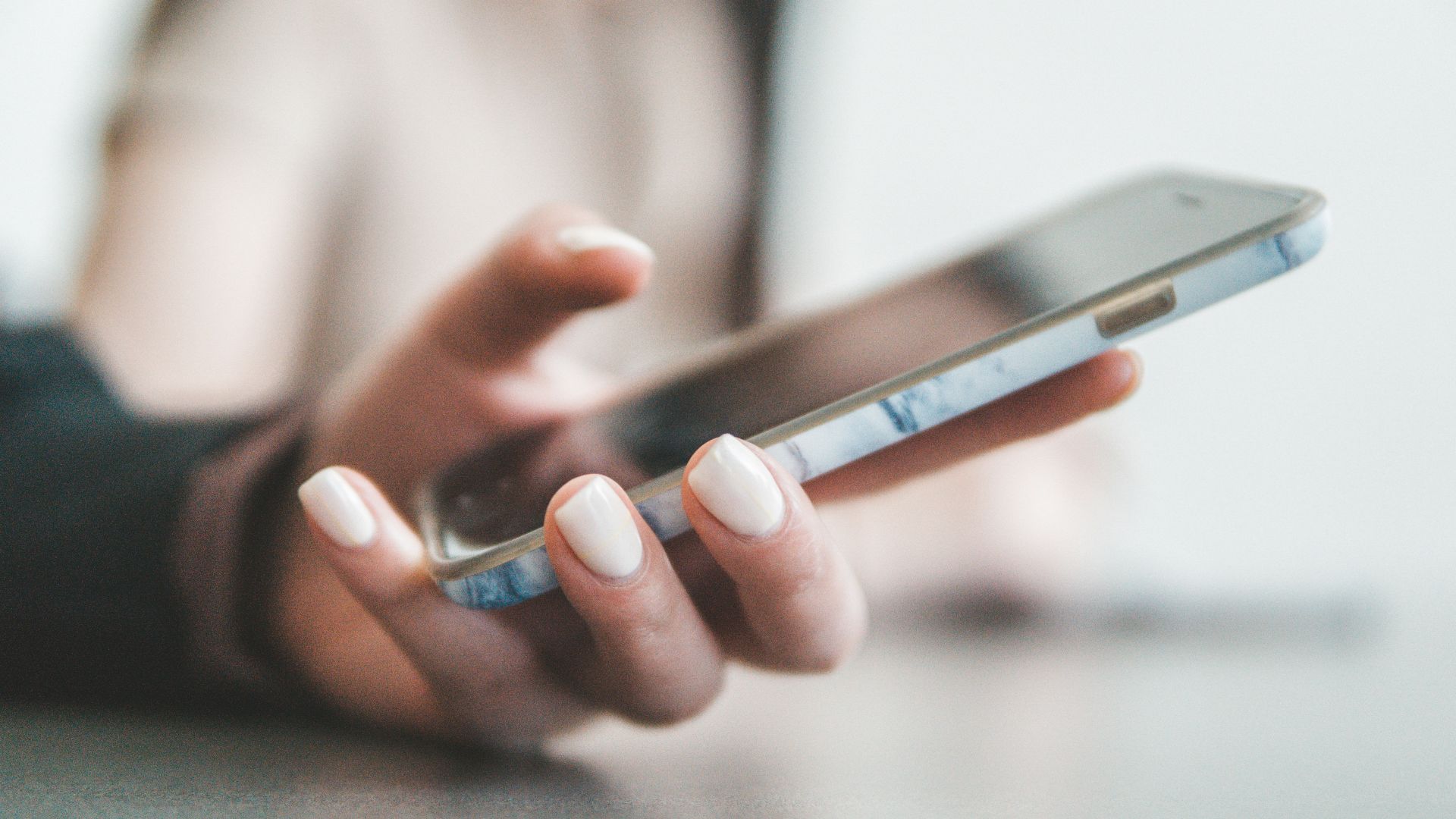person holding black smartphone