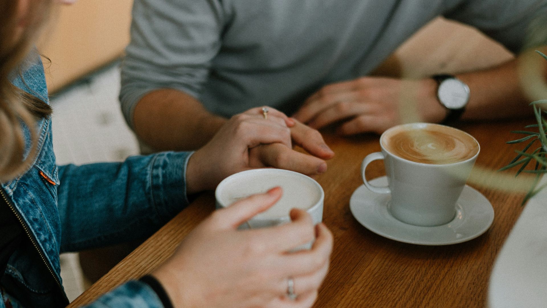 two mugs with coffee on table