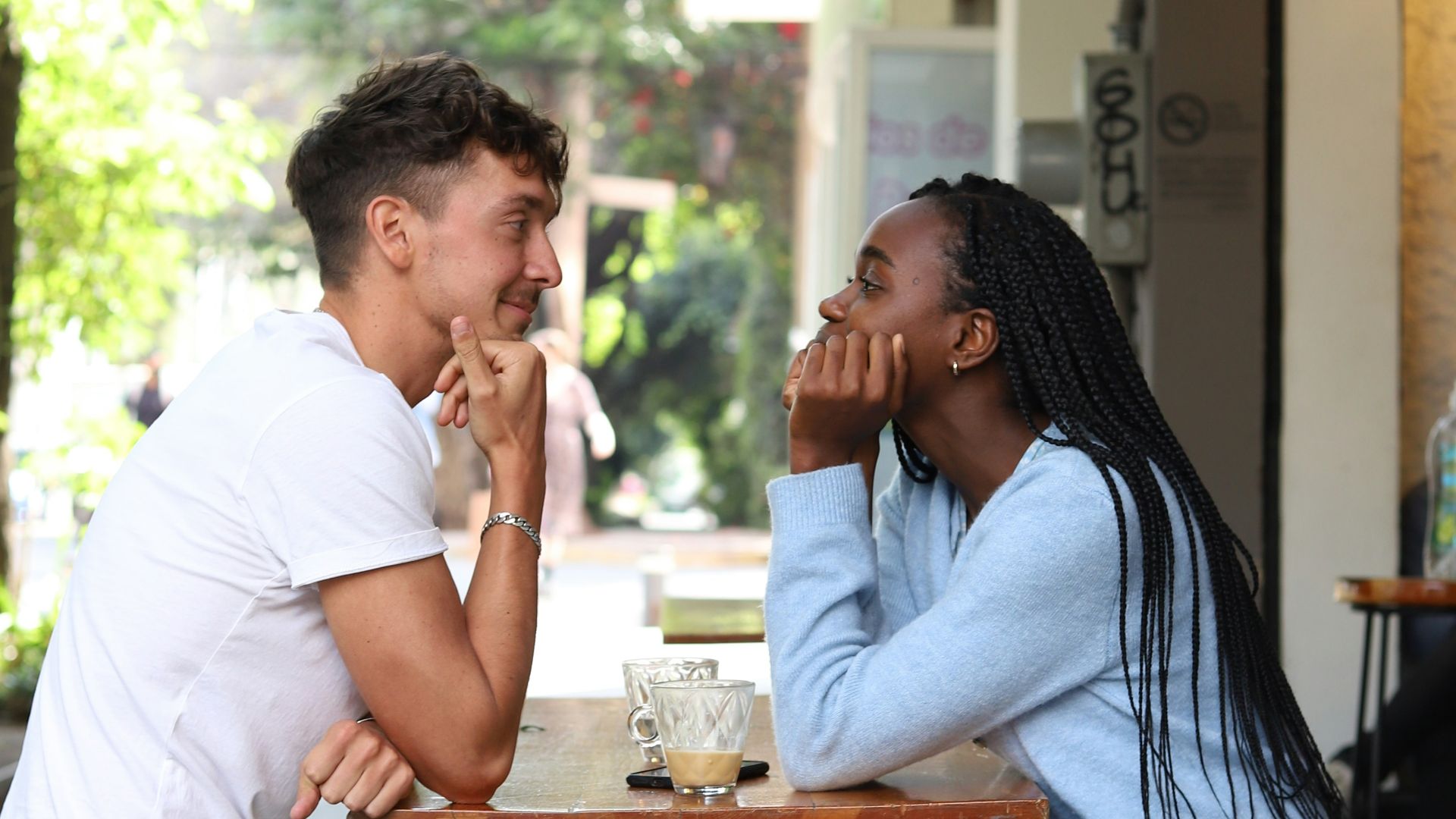 a man and a woman sitting at a table