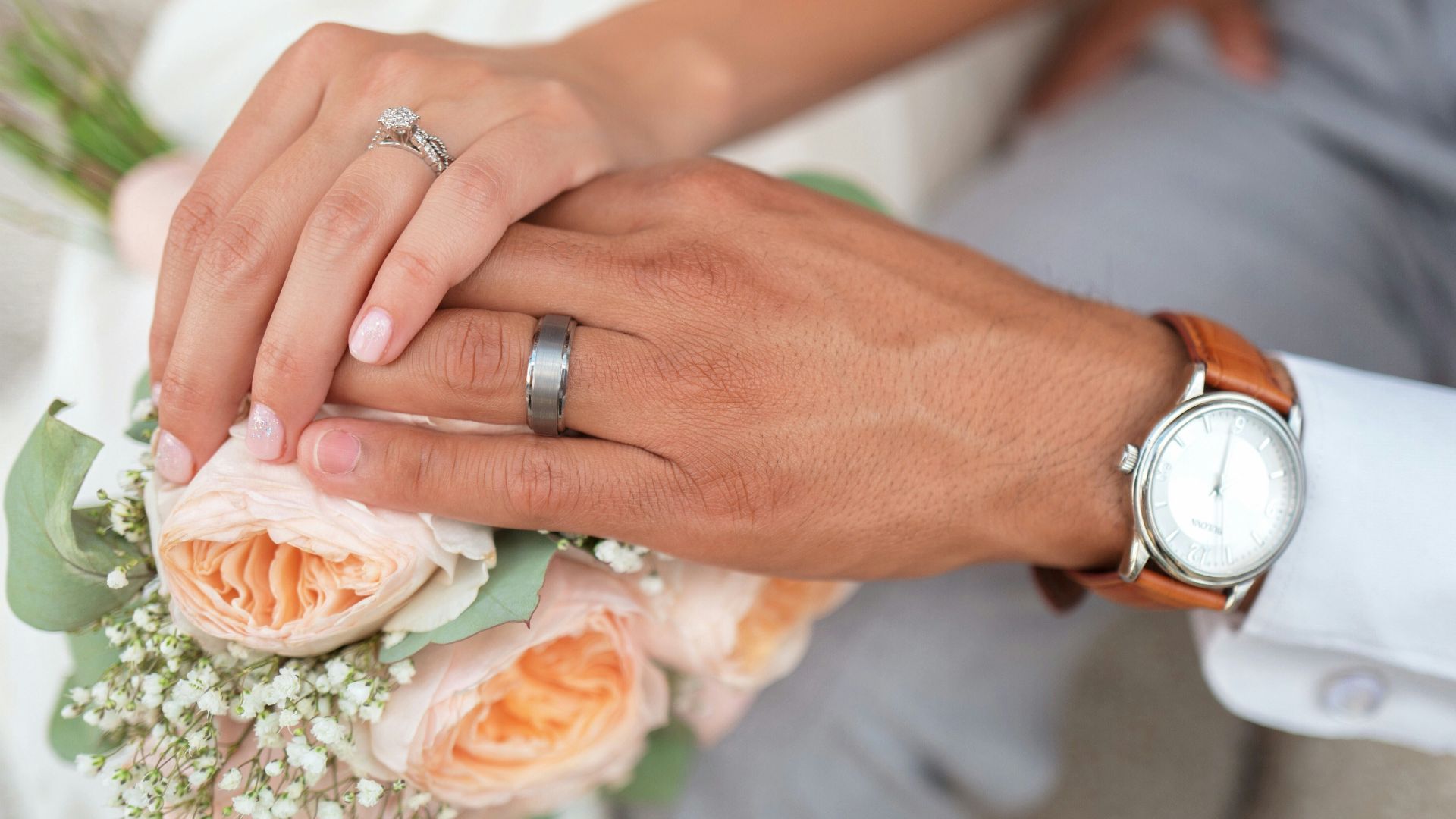 man and woman holding hands