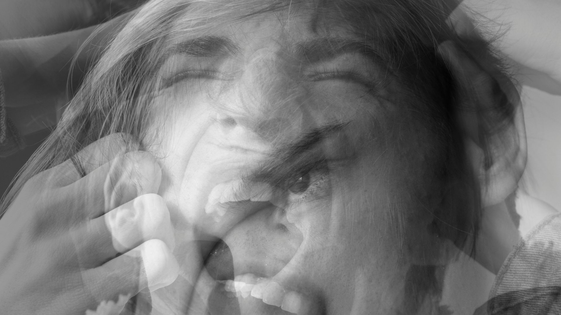 grayscale photo of man in suit