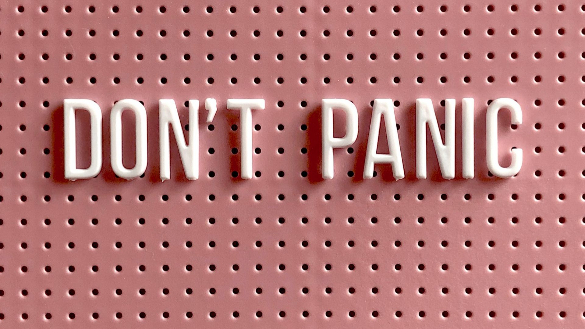 i love you text on pink and white polka dot background