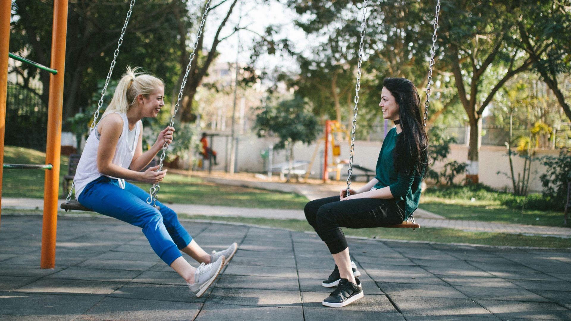 woman sitting on swing