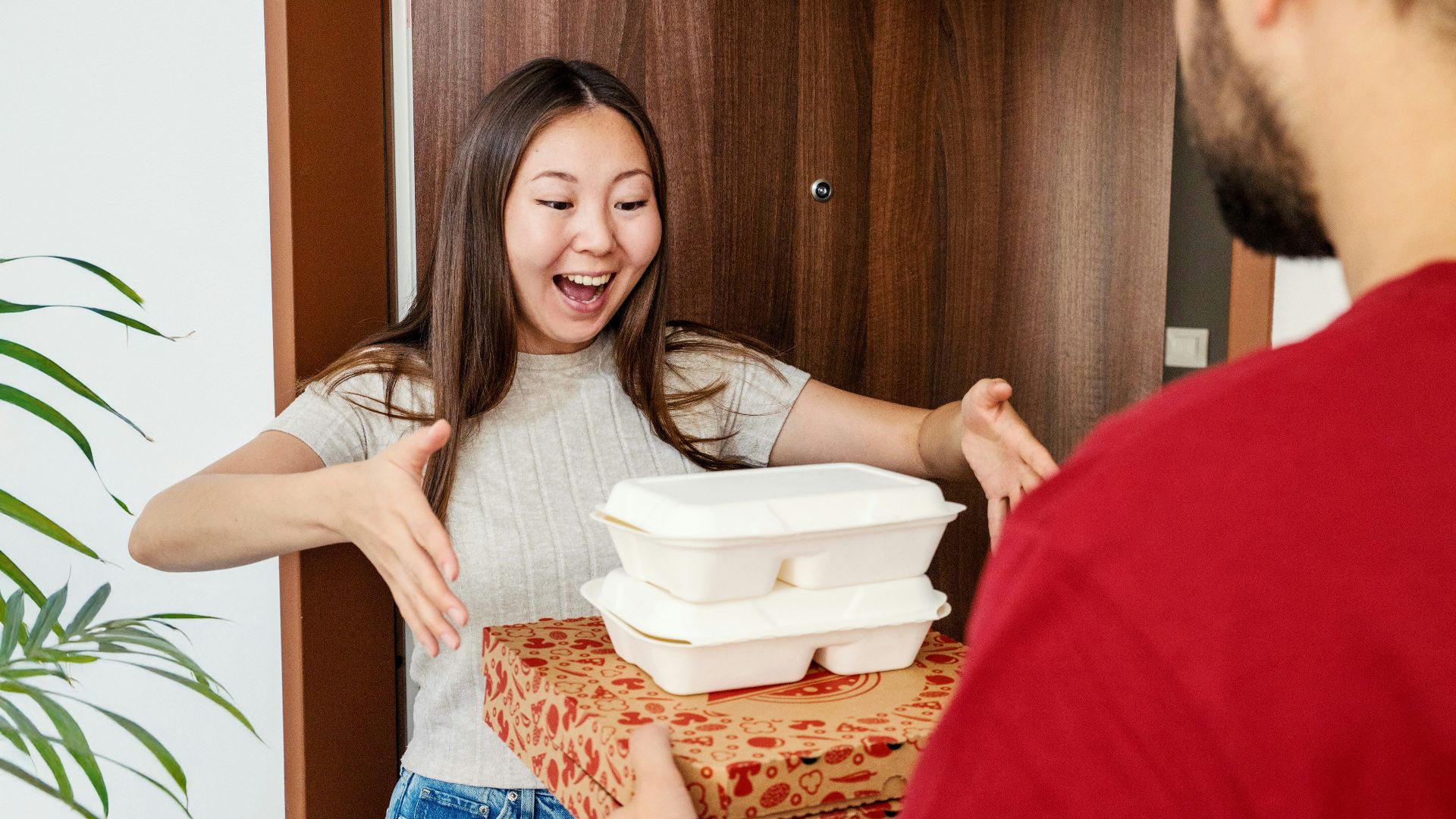 Food delivery makes a woman very happy.