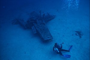 photo-of-person-scuba-diving-near-wreckage-3098969-300x201.jpg