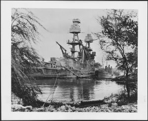 Photograph_of_the_USS_Nevada_one_of_the_first_of_the_Pearl_Harbor_ships_to_go_back_into_action_-_NARA_-_306542.tif-300x246.jpg